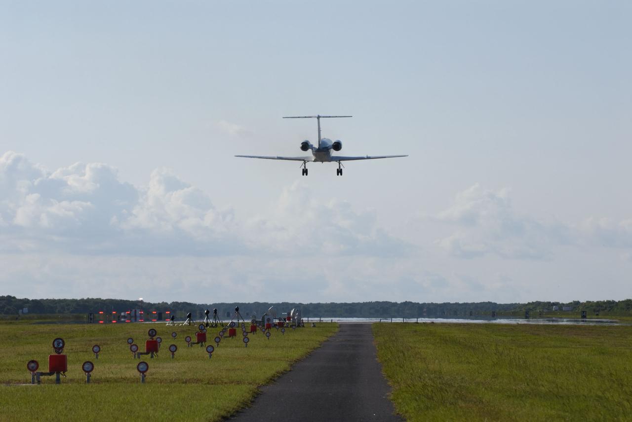 CAPE CANAVERAL, Fla. -- STS-135 Commander Chris Ferguson and Pilot Doug Hurley perform touch-and-go landings on the Shuttle Landing Facility runway at NASA's Kennedy Space Center in Florida. The pilot and commander of every shuttle mission routinely practice landings aboard Shuttle Training Aircraft, which are Gulfstream II jets modified to mimic the shuttle's handling during the final phase of landing. The STS-135 flight crew of four arrived aboard T-38 training jets to watch two historic milestones of NASA's Space Shuttle Program -- the final landing of shuttle Endeavour, which will bookend its STS-134 mission to the International Space Station, and the final rollout of their vehicle, space shuttle Atlantis, to Launch Pad 39A.      STS-135 will be the 33rd flight of Atlantis, the 37th shuttle mission to the space station, and the 135th and final mission of the shuttle program. For more information visit, www.nasa.gov/mission_pages/shuttle/shuttlemissions/sts135/index.html. Photo credit: NASA/Kim Shiflett