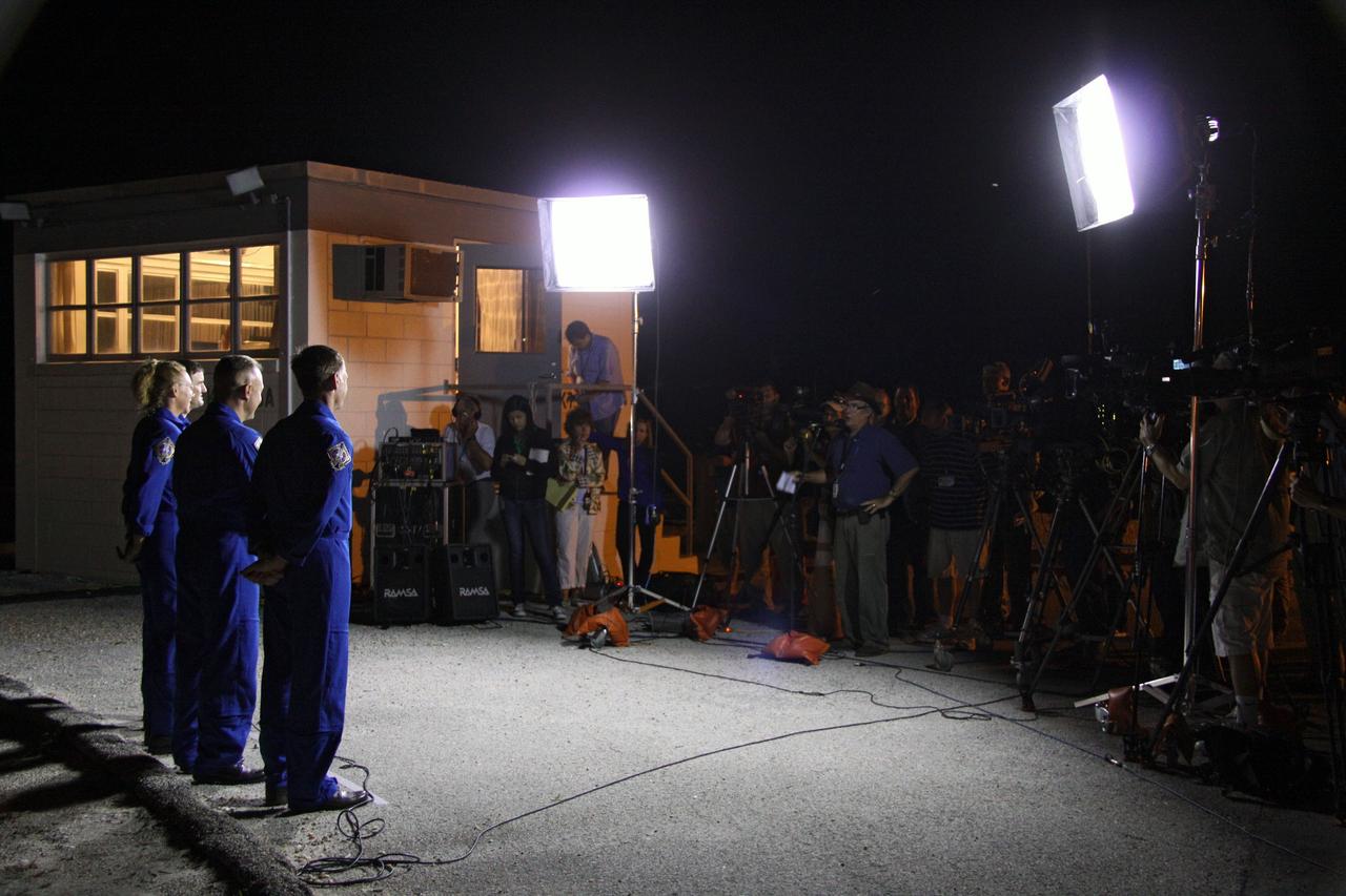 CAPE CANAVERAL, Fla. -- The STS-135 crew members talk to media as their vehicle, space shuttle Atlantis, makes its final journey from the Vehicle Assembly Building to Launch Pad 39A at NASA's Kennedy Space Center in Florida. First motion was at 8:42 p.m. EDT. It will take the crawler-transporter about six hours to carry the shuttle, attached to its external fuel tank and solid rocket boosters, to the seaside launch pad. The milestone move paves the way for the launch of the STS-135 mission to the International Space Station, targeted for July 8.        STS-135 will be the 33rd flight of Atlantis, the 37th shuttle mission to the space station, and the 135th and final mission of NASA's Space Shuttle Program. For more information visit, www.nasa.gov/mission_pages/shuttle/shuttlemissions/sts135/index.html. Photo credit: NASA/Troy Cryder