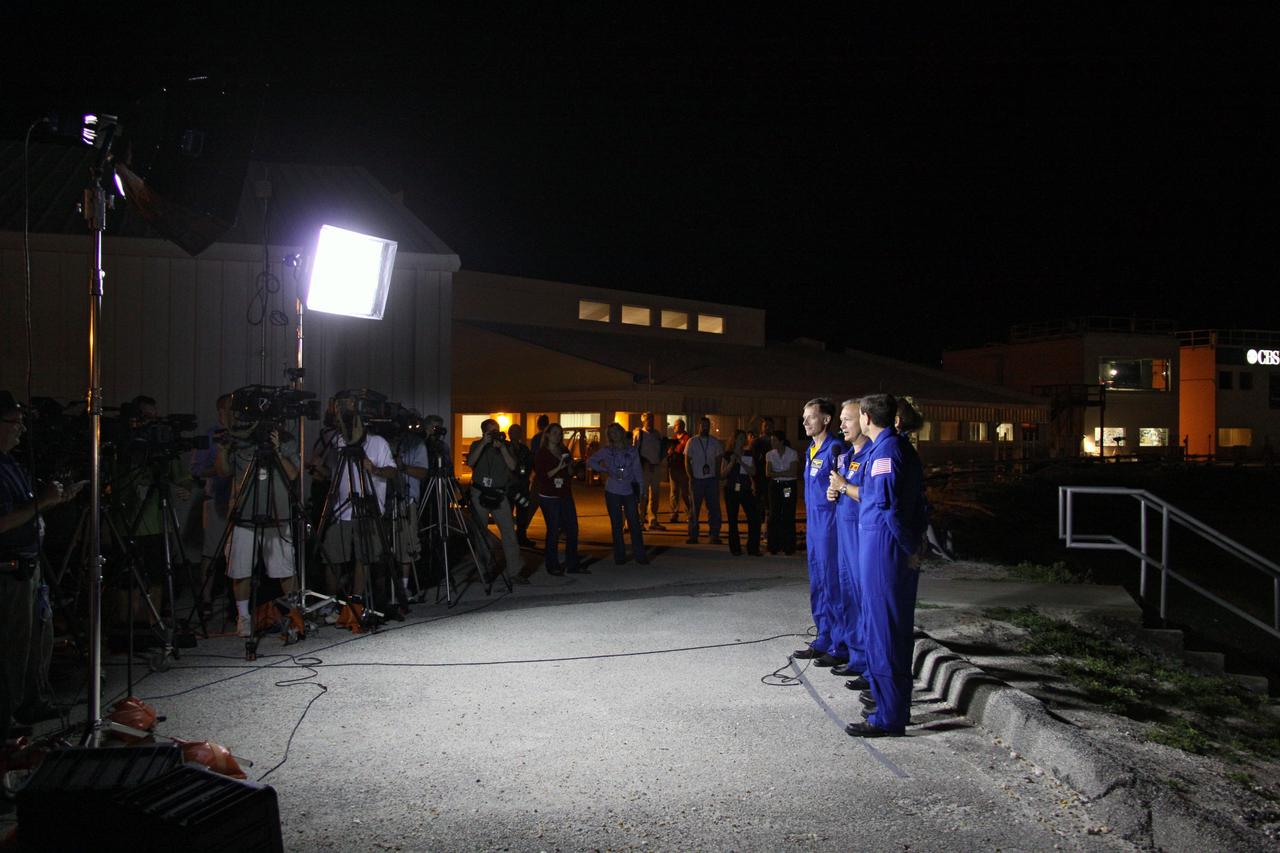 CAPE CANAVERAL, Fla. -- The STS-135 crew members talk to media as their vehicle, space shuttle Atlantis, makes its final journey from the Vehicle Assembly Building to Launch Pad 39A at NASA's Kennedy Space Center in Florida. First motion was at 8:42 p.m. EDT. It will take the crawler-transporter about six hours to carry the shuttle, attached to its external fuel tank and solid rocket boosters, to the seaside launch pad. The milestone move paves the way for the launch of the STS-135 mission to the International Space Station, targeted for July 8.          STS-135 will be the 33rd flight of Atlantis, the 37th shuttle mission to the space station, and the 135th and final mission of NASA's Space Shuttle Program. For more information visit, www.nasa.gov/mission_pages/shuttle/shuttlemissions/sts135/index.html. Photo credit: NASA/Troy Cryder