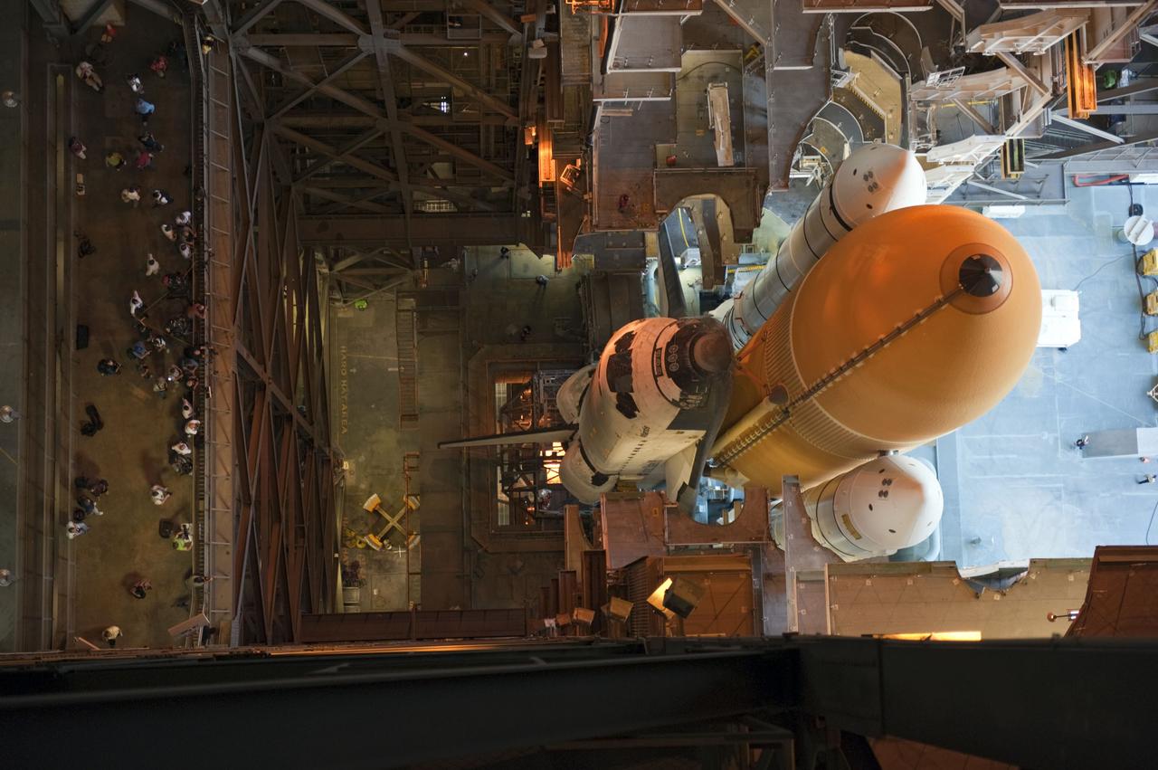 CAPE CANAVERAL, Fla. -- Space shuttle Atlantis, attached to its external fuel tank and solid rocket boosters atop a mobile launcher platform, awaits its final journey from the Vehicle Assembly Building to Launch Pad 39A at NASA's Kennedy Space Center in Florida. "Rollout," as it's called, began at 8:42 p.m. EDT. It will take the crawler-transporter about six hours to carry the shuttle stack to its seaside launch pad. The milestone move paves the way for the launch of the STS-135 mission to the International Space Station, targeted for July 8.        STS-135 will be the 33rd flight of Atlantis, the 37th shuttle mission to the space station, and the 135th and final mission of NASA's Space Shuttle Program. For more information visit, www.nasa.gov/mission_pages/shuttle/shuttlemissions/sts135/index.html. Photo credit: NASA/Kim Shiflett