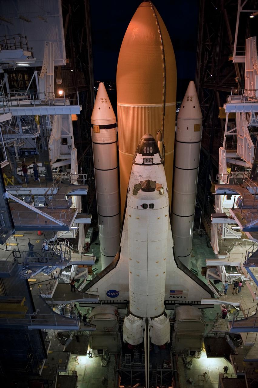 CAPE CANAVERAL, Fla. -- Space shuttle Atlantis, attached to its external fuel tank and solid rocket boosters atop a mobile launcher platform, slowly inches out of the Vehicle Assembly Building for the final time. "Rollout," as it's called, to Launch Pad 39A at NASA's Kennedy Space Center in Florida began at 8:42 p.m. EDT. It will take the crawler-transporter about six hours to carry the shuttle stack to its seaside launch pad. The milestone move paves the way for the launch of the STS-135 mission to the International Space Station, targeted for July 8.      STS-135 will be the 33rd flight of Atlantis, the 37th shuttle mission to the space station, and the 135th and final mission of NASA's Space Shuttle Program. For more information visit, www.nasa.gov/mission_pages/shuttle/shuttlemissions/sts135/index.html. Photo credit: NASA/Kim Shiflett