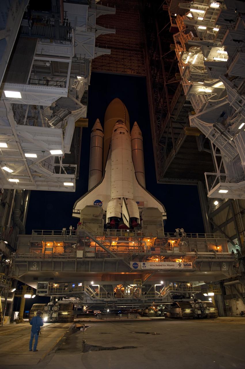 CAPE CANAVERAL, Fla. -- Space shuttle Atlantis, attached to its external fuel tank and solid rocket boosters atop a mobile launcher platform, makes its final debut outside the Vehicle Assembly Building. "Rollout," as it's called, to Launch Pad 39A at NASA's Kennedy Space Center in Florida began at 8:42 p.m. EDT. It will take the crawler-transporter about six hours to carry the shuttle stack to its seaside launch pad. The milestone move paves the way for the launch of the STS-135 mission to the International Space Station, targeted for July 8.        STS-135 will be the 33rd flight of Atlantis, the 37th shuttle mission to the space station, and the 135th and final mission of NASA's Space Shuttle Program. For more information visit, www.nasa.gov/mission_pages/shuttle/shuttlemissions/sts135/index.html. Photo credit: NASA/Kim Shiflett