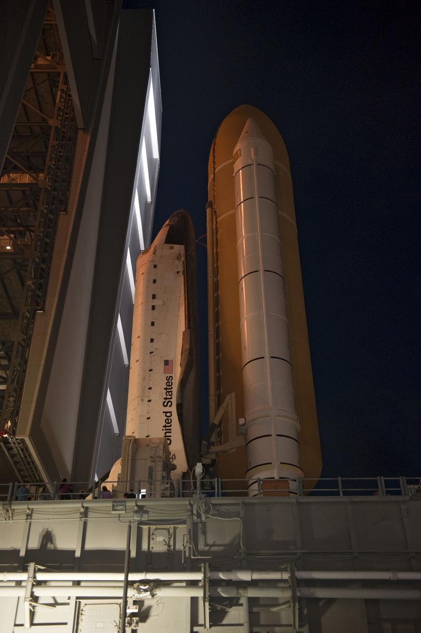CAPE CANAVERAL, Fla. -- Space shuttle Atlantis, attached to its external fuel tank and solid rocket boosters atop a mobile launcher platform, makes its final debut outside the Vehicle Assembly Building. "Rollout," as it's called, to Launch Pad 39A at NASA's Kennedy Space Center in Florida began at 8:42 p.m. EDT. It will take the crawler-transporter about six hours to carry the shuttle stack to its seaside launch pad. The milestone move paves the way for the launch of the STS-135 mission to the International Space Station, targeted for July 8.      STS-135 will be the 33rd flight of Atlantis, the 37th shuttle mission to the space station, and the 135th and final mission of NASA's Space Shuttle Program. For more information visit, www.nasa.gov/mission_pages/shuttle/shuttlemissions/sts135/index.html. Photo credit: NASA/Kim Shiflett