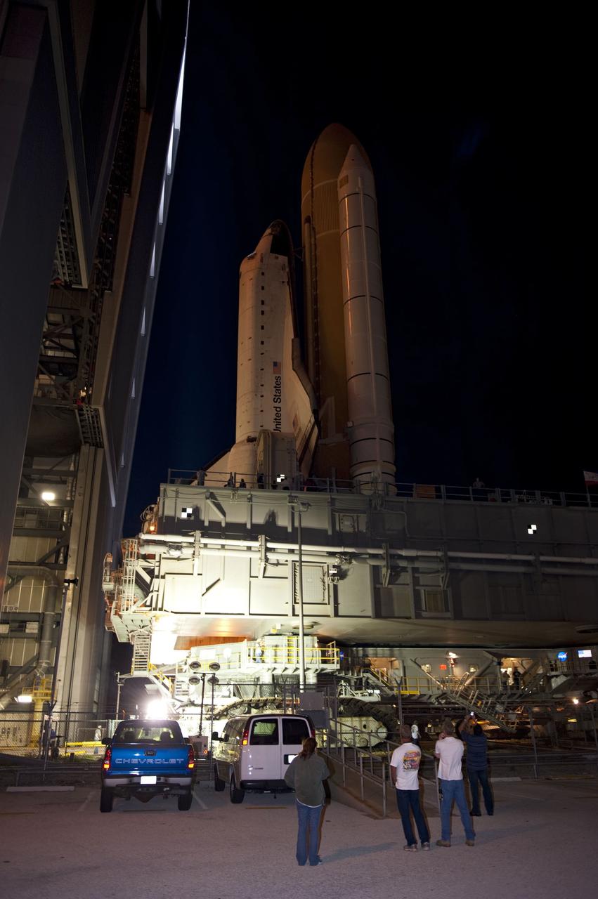 CAPE CANAVERAL, Fla. -- Space shuttle Atlantis, attached to its external fuel tank and solid rocket boosters atop a mobile launcher platform, makes its final debut outside the Vehicle Assembly Building. "Rollout," as it's called, to Launch Pad 39A at NASA's Kennedy Space Center in Florida began at 8:42 p.m. EDT. It will take the crawler-transporter about six hours to carry the shuttle stack to its seaside launch pad. The milestone move paves the way for the launch of the STS-135 mission to the International Space Station, targeted for July 8.        STS-135 will be the 33rd flight of Atlantis, the 37th shuttle mission to the space station, and the 135th and final mission of NASA's Space Shuttle Program. For more information visit, www.nasa.gov/mission_pages/shuttle/shuttlemissions/sts135/index.html. Photo credit: NASA/Kim Shiflett