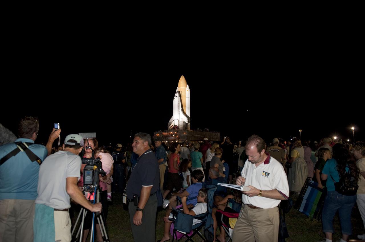 CAPE CANAVERAL, Fla. -- Thousands of spectators came out to watch space shuttle Atlantis' historic final journey from the Vehicle Assembly Building to Launch Pad 39A at NASA's Kennedy Space Center in Florida. First motion was at 8:42 p.m. EDT. It will take the crawler-transporter about six hours to carry the shuttle, attached to its external fuel tank and solid rocket boosters, to the seaside launch pad. The milestone move paves the way for the launch of the STS-135 mission to the International Space Station, targeted for July 8.      STS-135 will be the 33rd flight of Atlantis, the 37th shuttle mission to the space station, and the 135th and final mission of NASA's Space Shuttle Program. For more information visit, www.nasa.gov/mission_pages/shuttle/shuttlemissions/sts135/index.html. Photo credit: NASA/Kim Shiflett