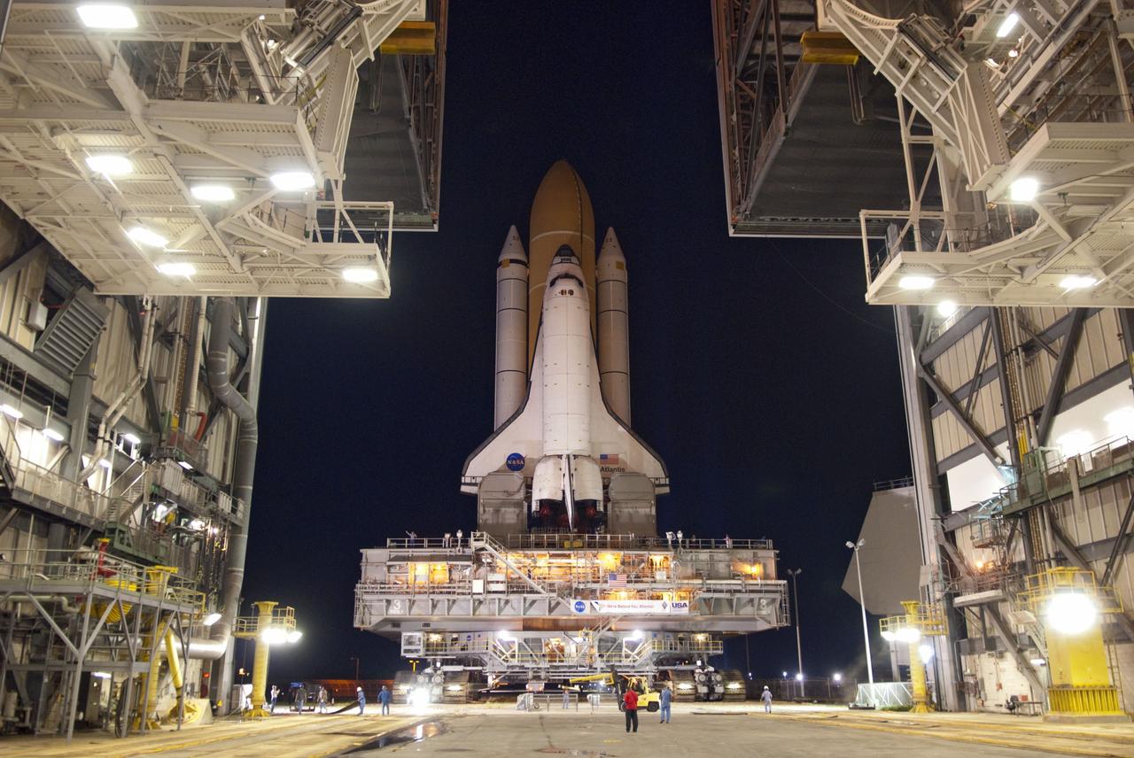 CAPE CANAVERAL, Fla. -- Space shuttle Atlantis, attached to its external fuel tank and solid rocket boosters atop a mobile launcher platform, makes its final debut outside the Vehicle Assembly Building. "Rollout," as it's called, to Launch Pad 39A at NASA's Kennedy Space Center in Florida began at 8:42 p.m. EDT. It will take the crawler-transporter about six hours to carry the shuttle stack to its seaside launch pad. The milestone move paves the way for the launch of the STS-135 mission to the International Space Station, targeted for July 8.    STS-135 will be the 33rd flight of Atlantis, the 37th shuttle mission to the space station, and the 135th and final mission of NASA's Space Shuttle Program. For more information visit, www.nasa.gov/mission_pages/shuttle/shuttlemissions/sts135/index.html. Photo credit: NASA/Jim Grossmann