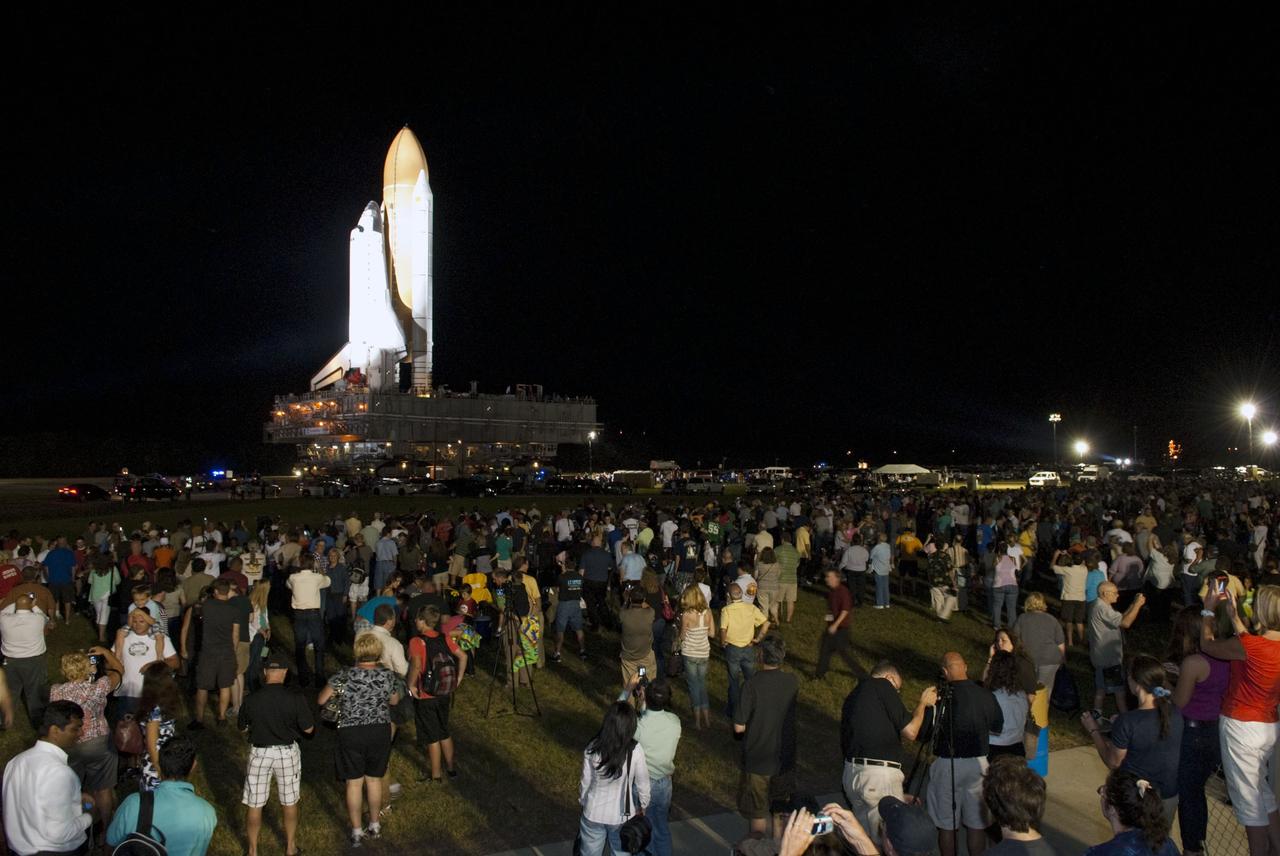CAPE CANAVERAL, Fla. -- Thousands of spectators came out to watch space shuttle Atlantis' historic final journey from the Vehicle Assembly Building to Launch Pad 39A at NASA's Kennedy Space Center in Florida. First motion was at 8:42 p.m. EDT. It will take the crawler-transporter about six hours to carry the shuttle, attached to its external fuel tank and solid rocket boosters, to the seaside launch pad. The milestone move paves the way for the launch of the STS-135 mission to the International Space Station, targeted for July 8.        STS-135 will be the 33rd flight of Atlantis, the 37th shuttle mission to the space station, and the 135th and final mission of NASA's Space Shuttle Program. For more information visit, www.nasa.gov/mission_pages/shuttle/shuttlemissions/sts135/index.html. Photo credit: NASA/Jim Grossmann