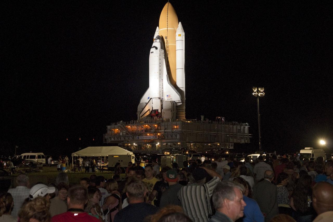 CAPE CANAVERAL, Fla. -- Thousands of spectators came out to watch space shuttle Atlantis' historic final journey from the Vehicle Assembly Building to Launch Pad 39A at NASA's Kennedy Space Center in Florida. First motion was at 8:42 p.m. EDT. It will take the crawler-transporter about six hours to carry the shuttle, attached to its external fuel tank and solid rocket boosters, to the seaside launch pad. The milestone move paves the way for the launch of the STS-135 mission to the International Space Station, targeted for July 8.        STS-135 will be the 33rd flight of Atlantis, the 37th shuttle mission to the space station, and the 135th and final mission of NASA's Space Shuttle Program. For more information visit, www.nasa.gov/mission_pages/shuttle/shuttlemissions/sts135/index.html. Photo credit: NASA/Jim Grossmann