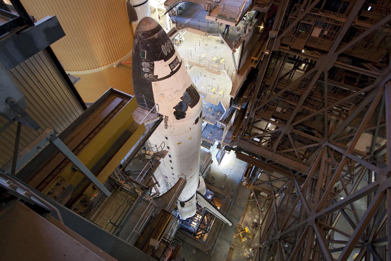 CAPE CANAVERAL, Fla. -- Space shuttle Atlantis, attached to its external fuel tank and solid rocket boosters atop a mobile launcher platform, awaits its final journey from the Vehicle Assembly Building to Launch Pad 39A at NASA's Kennedy Space Center in Florida. "Rollout," as it's called, began at 8:42 p.m. EDT. It will take the crawler-transporter about six hours to carry the shuttle stack to its seaside launch pad. The milestone move paves the way for the launch of the STS-135 mission to the International Space Station, targeted for July 8.        STS-135 will be the 33rd flight of Atlantis, the 37th shuttle mission to the space station, and the 135th and final mission of NASA's Space Shuttle Program. For more information visit, www.nasa.gov/mission_pages/shuttle/shuttlemissions/sts135/index.html. Photo credit: NASA/Jack Pfaller
