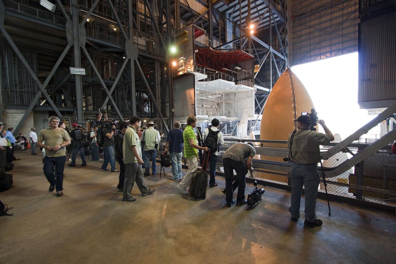 CAPE CANAVERAL, Fla. -- Media snap photos of space shuttle Atlantis, attached to its external fuel tank and solid rocket boosters atop a mobile launcher platform, for the final time in the Vehicle Assembly Building at NASA's Kennedy Space Center in Florida. The shuttle is awaiting its final journey, known as "rollout," to Launch Pad 39A. The milestone move will pave the way for the launch of the STS-135 mission to the International Space Station, targeted for July 8.      STS-135 will be the 33rd flight of Atlantis, the 37th shuttle mission to the space station, and the 135th and final mission of NASA's Space Shuttle Program. For more information visit, www.nasa.gov/mission_pages/shuttle/shuttlemissions/sts135/index.html. Photo credit: NASA/Jack Pfaller
