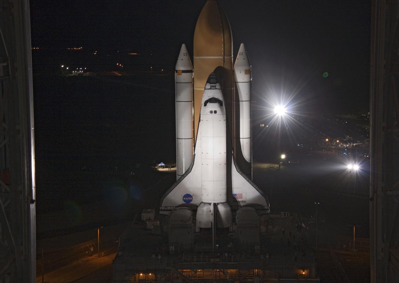 CAPE CANAVERAL, Fla. -- Bright xenon lights greet space shuttle Atlantis as the vehicle makes its final debut outside the Vehicle Assembly Building. "Rollout," as it's called, to Launch Pad 39A at NASA's Kennedy Space Center in Florida began at 8:42 p.m. EDT. It will take the crawler-transporter about six hours to carry the shuttle, attached to its external fuel tank and solid rocket boosters atop a mobile launcher platform, to its seaside launch pad. The milestone move paves the way for the launch of the STS-135 mission to the International Space Station, targeted for July 8.        STS-135 will be the 33rd flight of Atlantis, the 37th shuttle mission to the space station, and the 135th and final mission of NASA's Space Shuttle Program. For more information visit, www.nasa.gov/mission_pages/shuttle/shuttlemissions/sts135/index.html. Photo credit: NASA/Jack Pfaller