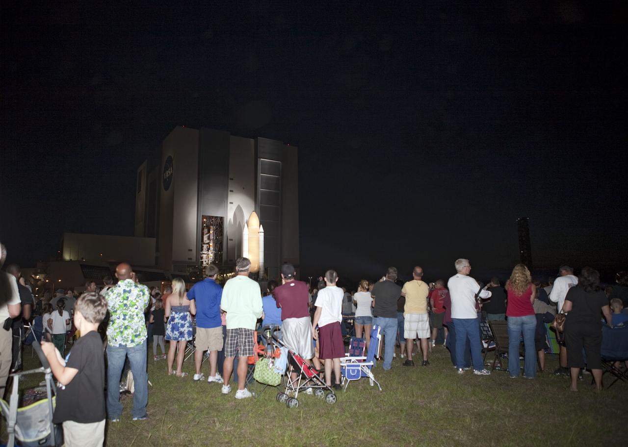 CAPE CANAVERAL, Fla. -- Thousands of spectators watch as space shuttle Atlantis makes its final debut outside the Vehicle Assembly Building at NASA's Kennedy Space Center in Florida. "Rollout," as it's called, to Launch Pad 39A at NASA's Kennedy Space Center in Florida began at 8:42 p.m. EDT. It will take the crawler-transporter about six hours to carry the shuttle, attached to its external fuel tank and solid rocket boosters atop a mobile launcher platform, to its seaside launch pad. The milestone move paves the way for the launch of the STS-135 mission to the International Space Station, targeted for July 8.      STS-135 will be the 33rd flight of Atlantis, the 37th shuttle mission to the space station, and the 135th and final mission of NASA's Space Shuttle Program. For more information visit, www.nasa.gov/mission_pages/shuttle/shuttlemissions/sts135/index.html. Photo credit: NASA/Gianni Woods