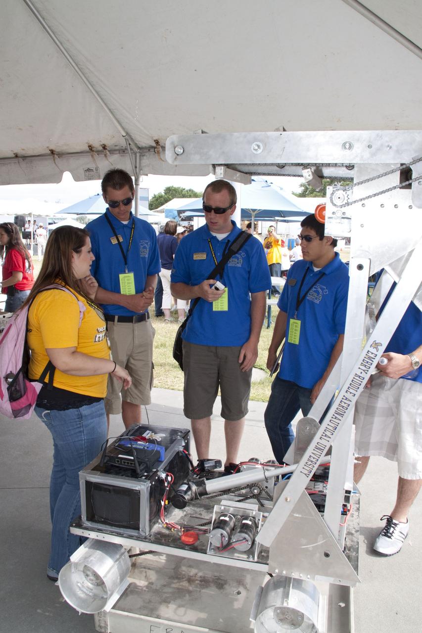 CAPE CANAVERAL, Fla. -- University students make final preparations for NASA's second annual Lunabotics Mining Competition held at the Kennedy Space Center Visitor Complex in Florida.        Thirty-six teams of undergraduate and graduate students from the United States, Bangladesh, Canada, Colombia and India will participate in NASA's Lunabotics Mining Competition May 26 - 28 at the agency's Kennedy Space Center in Florida. The competition is designed to engage and retain students in science, technology, engineering and mathematics (STEM). Teams will maneuver their remote controlled or autonomous excavators, called lunabots, in about 60 tons of ultra-fine simulated lunar soil, called BP-1. The competition is an Exploration Systems Mission Directorate project managed by Kennedy's Education Division. The event also provides a competitive environment that could result in innovative ideas and solutions for NASA's future excavation of the moon. Photo credit: NASA/Jack Pfaller