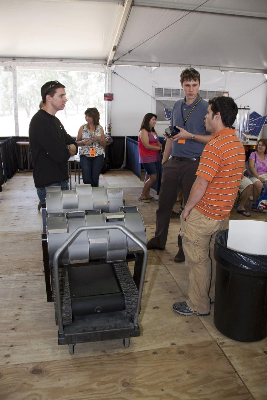 CAPE CANAVERAL, Fla. -- University students wait their turn to compete in NASA's second annual Lunabotics Mining Competition at the Kennedy Space Center Visitor Complex in Florida. Thirty-six teams of undergraduate and graduate students from the United States, Bangladesh, Canada, Colombia and India will participate in NASA's Lunabotics Mining Competition May 26 - 28 at the agency's Kennedy Space Center in Florida. The competition is designed to engage and retain students in science, technology, engineering and mathematics (STEM). Teams will maneuver their remote controlled or autonomous excavators, called lunabots, in about 60 tons of ultra-fine simulated lunar soil, called BP-1. The competition is an Exploration Systems Mission Directorate project managed by Kennedy's Education Division. The event also provides a competitive environment that could result in innovative ideas and solutions for NASA's future excavation of the moon. Photo credit: NASA/Jack Pfaller