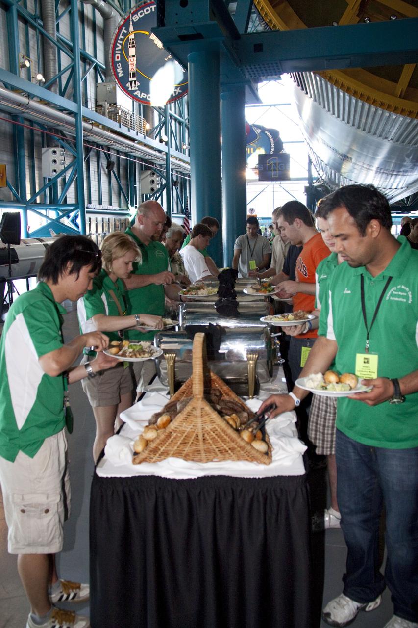 CAPE CANAVERAL, Fla. -- At NASA Kennedy Space Center's Apollo/Saturn V Center, university students take part in an award ceremony for NASA's second annual Lunabotics Mining Competition.              Thirty-six teams of undergraduate and graduate students from the United States, Bangladesh, Canada, Colombia and India participated in NASA's Lunabotics Mining Competition May 26 - 28 at the agency's Kennedy Space Center in Florida. The competition is designed to engage and retain students in science, technology, engineering and mathematics (STEM). Teams will maneuver their remote controlled or autonomous excavators, called lunabots, in about 60 tons of ultra-fine simulated lunar soil, called BP-1. The competition is an Exploration Systems Mission Directorate project managed by Kennedy's Education Division. The event also provides a competitive environment that could result in innovative ideas and solutions for NASA's future excavation of the moon. Photo credit: NASA/Jack Pfaller