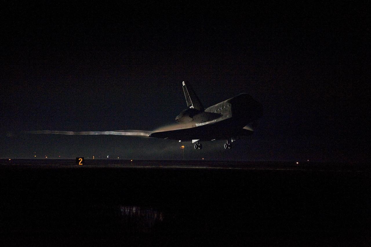 CAPE CANAVERAL, Fla. -- Vapor trails follow space shuttle Endeavour as it approaches Runway 15 on the Shuttle Landing Facility at NASA's Kennedy Space Center in Florida for the final time. A vapor trail, known as a contrail, is a cloud of water vapor that condenses and freezes around the small particles in aircraft exhaust. Main gear touchdown was at 2:34:51 a.m. EDT, followed by nose gear touchdown at 2:35:04 a.m., and wheelstop at 2:35:36 a.m. On board are STS-134 Commander Mark Kelly, Pilot Greg H. Johnson, and Mission Specialists Mike Fincke, Drew Feustel, Greg Chamitoff and the European Space Agency's Roberto Vittori.    STS-134 delivered the Alpha Magnetic Spectrometer-2 (AMS) and the Express Logistics Carrier-3 (ELC-3) to the International Space Station. AMS will help researchers understand the origin of the universe and search for evidence of dark matter, strange matter and antimatter from the station. ELC-3 carried spare parts that will sustain station operations once the shuttles are retired from service. STS-134 was the 25th and final flight for Endeavour, which has spent 299 days in space, orbited Earth 4,671 times and traveled 122,883,151 miles. Photo credit: NASA/Kevin O'Connell