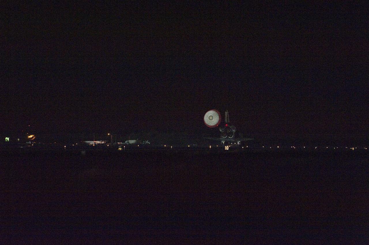 CAPE CANAVERAL, Fla. -- Space shuttle Endeavour rolls to a stop on the Shuttle Landing Facility's Runway 15 at NASA's Kennedy Space Center in Florida for the final time. Main gear touchdown was at 2:34:51 a.m. EDT, followed by nose gear touchdown at 2:35:04 a.m., and wheelstop at 2:35:36 a.m. On board are STS-134 Commander Mark Kelly, Pilot Greg H. Johnson, and Mission Specialists Mike Fincke, Drew Feustel, Greg Chamitoff and the European Space Agency's Roberto Vittori. STS-134 delivered the Alpha Magnetic Spectrometer-2 (AMS) and the Express Logistics Carrier-3 (ELC-3) to the International Space Station. AMS will help researchers understand the origin of the universe and search for evidence of dark matter, strange matter and antimatter from the station. ELC-3 carried spare parts that will sustain station operations once the shuttles are retired from service. STS-134 was the 25th and final flight for Endeavour, which has spent 299 days in space, orbited Earth 4,671 times and traveled 122,883,151 miles. Photo credit: NASA/Kevin O'Connell