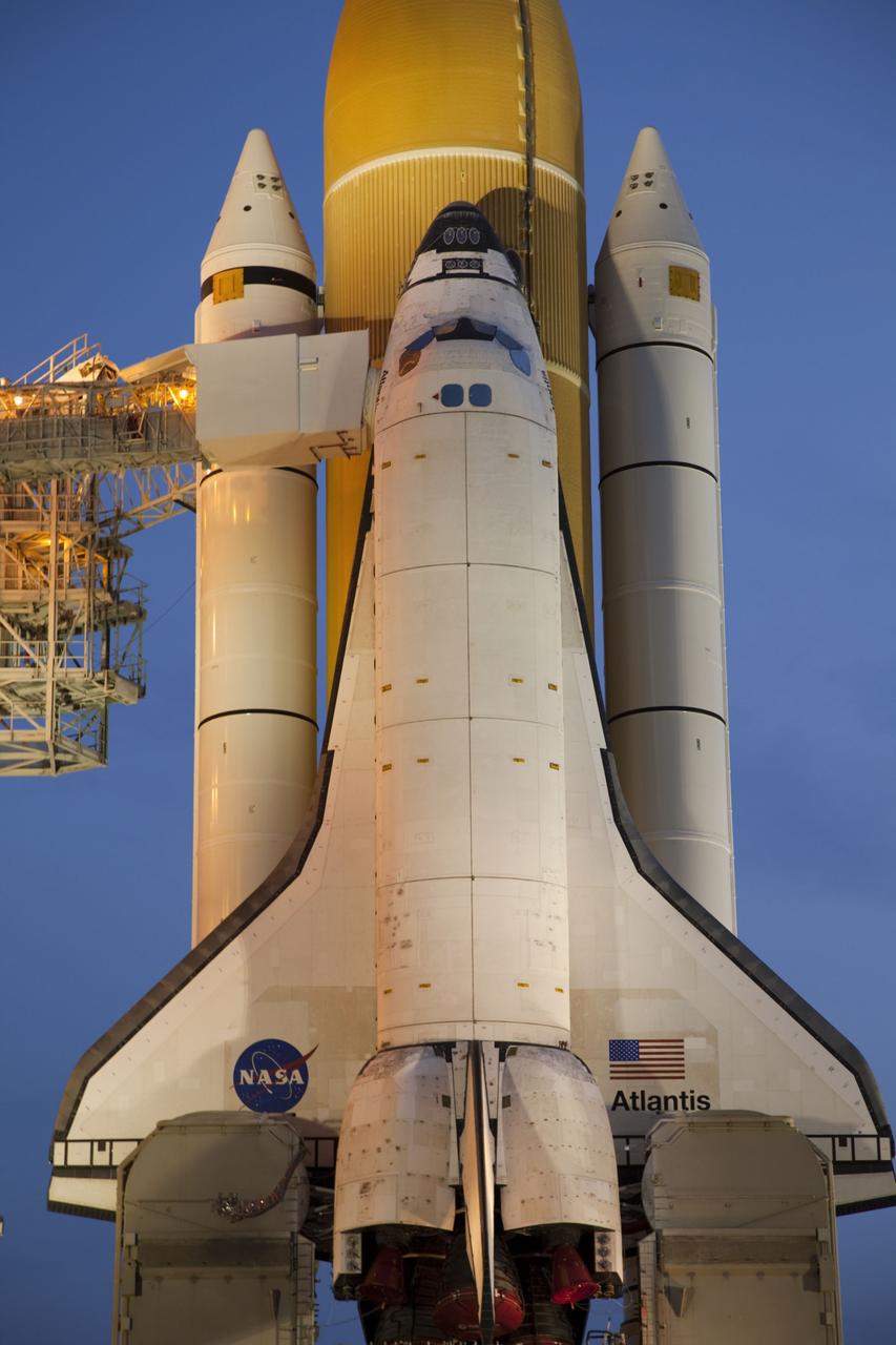 CAPE CANAVERAL, Fla. -- Sunrise at Launch Pad 39A at NASA's Kennedy Space Center in Florida finds space shuttle Atlantis after completing its historic and final journey from the Vehicle Assembly Building. Atlantis was secured or "hard down," at its seaside launch pad at 3:29 a.m. EDT on Wednesday, June 1.      The milestone move, known as "rollout," paves the way for the launch of the STS-135 mission to the International Space Station, targeted for July 8. STS-135 will be the 33rd flight of Atlantis, the 37th shuttle mission to the space station, and the 135th and final mission of NASA's Space Shuttle Program. For more information visit: www.nasa.gov/mission_pages/shuttle/shuttlemissions/sts135/index.html. Photo credit: NASA/Terry Zaperach