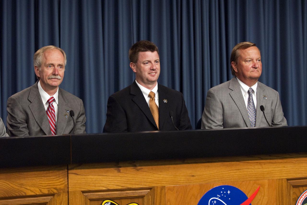 CAPE CANAVERAL, Fla. -- In the Press Site auditorium at NASA's Kennedy Space Center in Florida, NASA managers brief media after space shuttle Endeavour's successful landing and conclusion of its STS-134 and final mission. From left are, Associate Administrator for Space Operations Bill Gerstenmaier, Space Shuttle Program Launch Integration Manager Mike Moses; and Shuttle Launch Director Mike Leinbach.          Endeavour and its crew delivered the Alpha Magnetic Spectrometer-2 (AMS) and the Express Logistics Carrier-3 (ELC-3) to the International Space Station. AMS will help researchers understand the origin of the universe and search for evidence of dark matter, strange matter and antimatter from the station. ELC-3 carried spare parts that will sustain station operations once the shuttles are retired from service. STS-134 was the 25th and final flight for Endeavour, which spent 299 days in space, orbited Earth 4,671 times and traveled 122,883,151 miles. Photo credit: NASA/Kim Shiflett