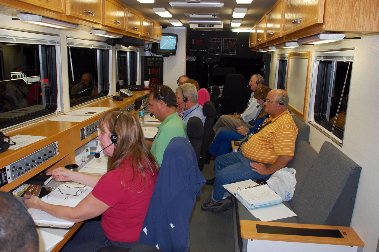 CAPE CANAVERAL, Fla. -- At NASA's Kennedy Space Center in Florida, a team of highly trained personnel inside the Convoy Command Vehicle is ready to "safe" shuttle Endeavour. The command vehicle is equipped to control critical communications between the crew still aboard Endeavour and the Launch Control Center. The team will monitor the health of the orbiter systems and direct convoy operations made up of about 40 vehicles, including 25 specially designed vehicles to assist the crew in leaving the shuttle, and prepare the vehicle for towing from the Shuttle Landing Facility to Orbiter Processing Facility-1.    Endeavour's final return from space completed the 16-day, 6.5-million-mile STS-134 mission. Main gear touchdown was at 2:34:51 a.m. EDT, followed by nose gear touchdown at 2:35:04 a.m., and wheelstop at 2:35:36 a.m. STS-134 delivered the Alpha Magnetic Spectrometer-2 (AMS) and the Express Logistics Carrier-3 (ELC-3) to the International Space Station. AMS will help researchers understand the origin of the universe and search for evidence of dark matter, strange matter and antimatter from the station. ELC-3 carried spare parts that will sustain station operations once the shuttles are retired from service. STS-134 was the 25th and final flight for Endeavour, which spent 299 days in space, orbited Earth 4,671 times and traveled 122,883,151 miles. Photo credit: NASA/Ben Smegelsky