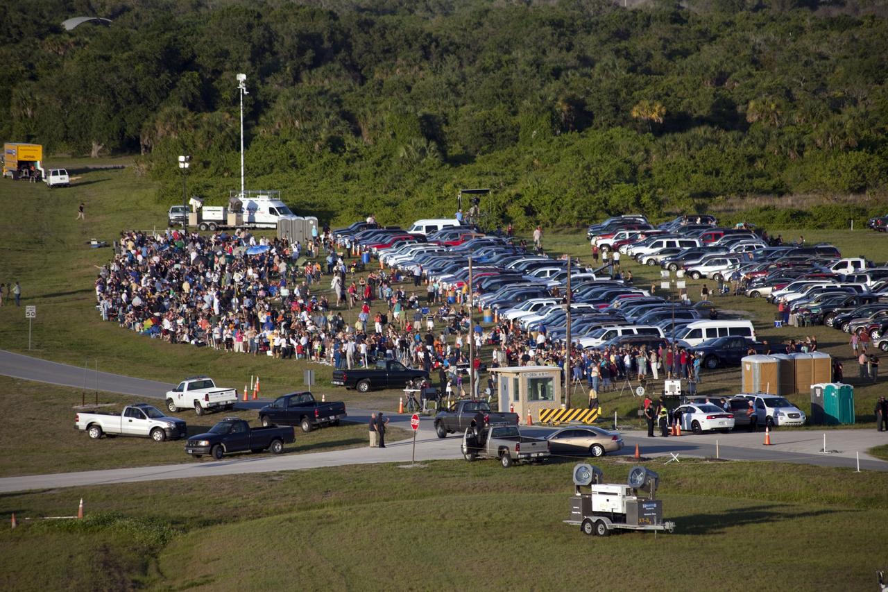 Cape Canaveral, Fla. -- Spectators gather to watch space shuttle Atlantis make its historic final journey to Launch Pad 39A from NASA Kennedy Space Center's Vehicle Assembly Building. First motion was at 8:42 p.m. EDT. It will take the crawler-transporter about six hours to carry the shuttle, attached to its external fuel tank and solid rocket boosters, to the seaside launch pad.          The milestone move, known as "rollout," paves the way for the launch of the STS-135 mission to the International Space Station, targeted for July 8. STS-135 will be the 33rd flight of Atlantis, the 37th shuttle mission to the space station, and the 135th and final mission of NASA's Space Shuttle Program. For more information visit: www.nasa.gov/mission_pages/shuttle/shuttlemissions/sts135/index.html. Photo credit: NASA/Terry Zaperach