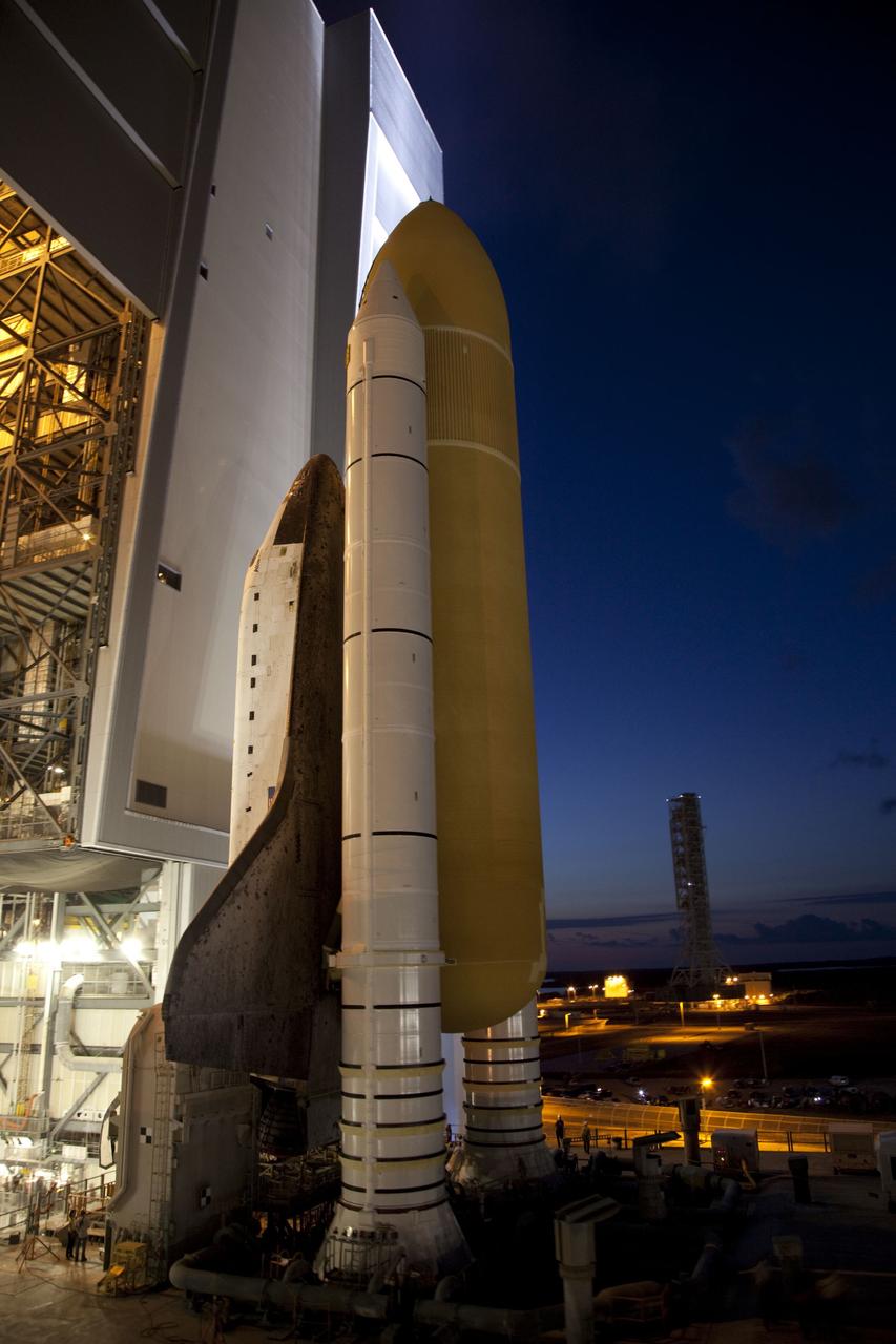 CAPE CANAVERAL, Fla. -- Space shuttle Atlantis, attached to its external fuel tank and solid rocket boosters atop a mobile launcher platform, slowly inches out of the Vehicle Assembly Building for the final time. "Rollout," to Launch Pad 39A at NASA's Kennedy Space Center in Florida began at 8:42 p.m. EDT. It will take the crawler-transporter about six hours to carry the shuttle stack to its seaside launch pad. The milestone move, known as "rollout," paves the way for the launch of the STS-135 mission to the International Space Station, targeted for July 8. STS-135 will be the 33rd flight of Atlantis, the 37th shuttle mission to the space station, and the 135th and final mission of NASA's Space Shuttle Program. For more information visit: www.nasa.gov/mission_pages/shuttle/shuttlemissions/sts135/index.html. Photo credit: NASA/Terry Zaperach