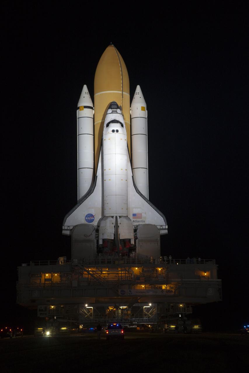 CAPE CANAVERAL, Fla. -- At a slow pace of about 1 mph, space shuttle Atlantis makes its final journey from the Vehicle Assembly Building to Launch Pad 39A at NASA's Kennedy Space Center in Florida. First motion was at 8:42 p.m. EDT. It will take the crawler-transporter about six hours to carry the shuttle, attached to its external fuel tank and solid rocket boosters, to the seaside launch pad.                The milestone move, known as "rollout," paves the way for the launch of the STS-135 mission to the International Space Station, targeted for July 8. STS-135 will be the 33rd flight of Atlantis, the 37th shuttle mission to the space station, and the 135th and final mission of NASA's Space Shuttle Program. For more information visit: www.nasa.gov/mission_pages/shuttle/shuttlemissions/sts135/index.html. Photo credit: NASA/Terry Zaperach