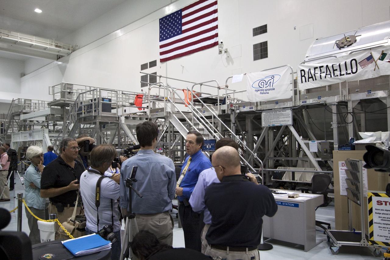 CAPE CANAVERAL, Fla. -- In the Space Station Processing Facility at NASA's Kennedy Space Center in Florida, Mike Kinslow, STS-135 Payload Flow Manager from Boeing Space Operations speaks to media about the payload for shuttle Atlantis' flight to the International Space Station. Commander Chris Ferguson, Pilot Doug Hurley and Mission Specialists Sandra Magnus and Rex Walheim are targeted to lift off on July 8, taking with them the Raffaello multi-purpose logistics module packed with supplies, logistics and spare parts. The STS-135 mission also will fly a system to investigate the potential for robotically refueling existing spacecraft and return a failed ammonia pump module to help NASA better understand the failure mechanism and improve pump designs for future systems. STS-135 will be the 33rd flight of Atlantis, the 37th shuttle mission to the space station, and the 135th and final mission of NASA's Space Shuttle Program. For more information visit, www.nasa.gov/mission_pages/shuttle/shuttlemissions/sts135/index.html. Photo credit: NASA/Jack Pfaller