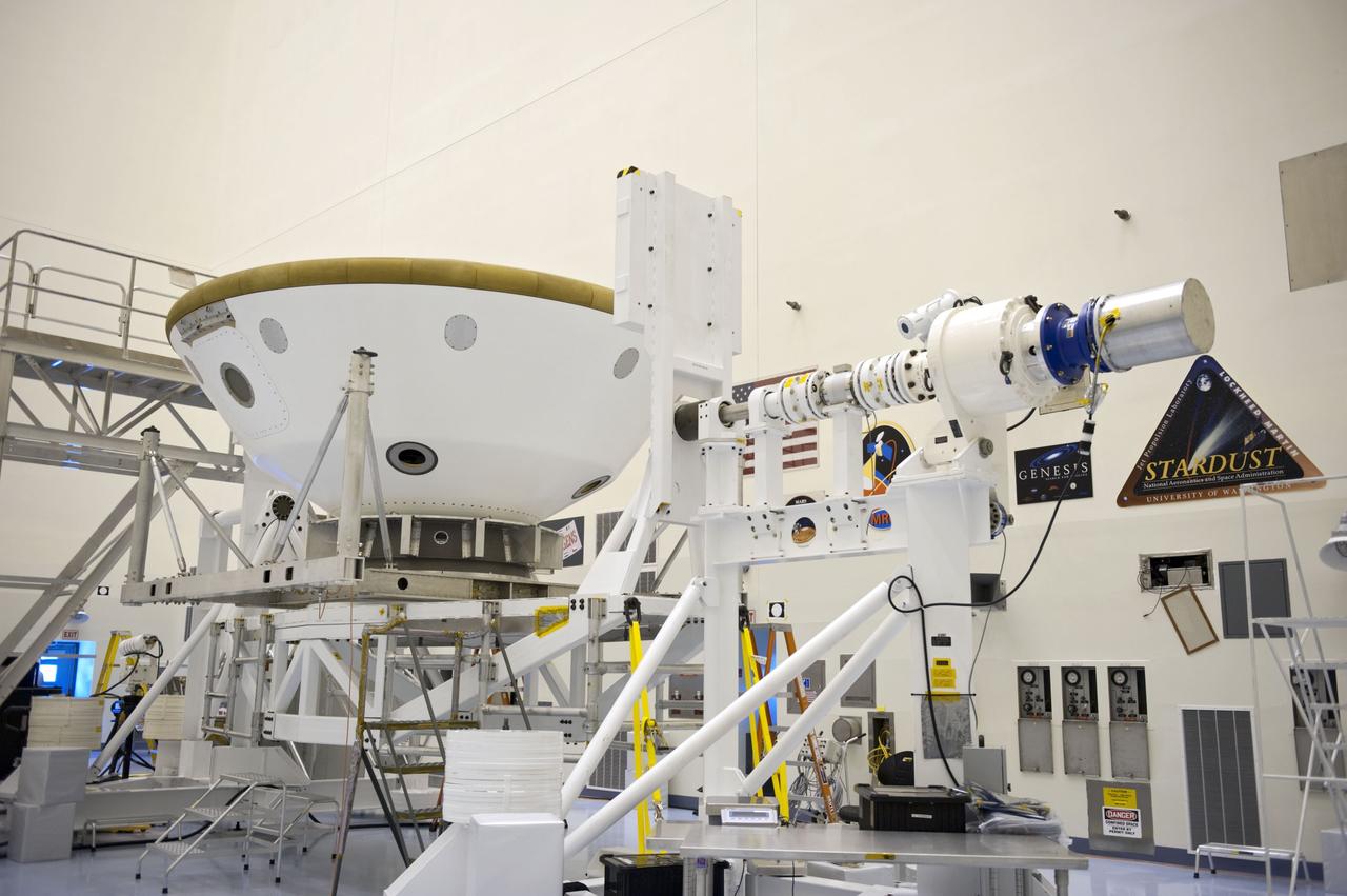 Cape Canaveral, Fla. -- At the Payload Hazardous Servicing Facility at NASA's Kennedy Space Center in Florida, technicians have moved the aeroshell, a component of NASA's Mars Science Laboratory (MSL), back to a work stand after a spin and balance test. The aeroshell consists of the backshell which carries the parachute and several components used during later stages of entry, descent and landing, and the spacecraft's heat shield. MSL's components include a compact car-sized rover, Curiosity, which has 10 science instruments designed to search for evidence on whether Mars has had environments favorable to microbial life, including chemical ingredients for life. The unique rover will use a laser to look inside rocks and release its gasses so that the rover’s spectrometer can analyze and send the data back to Earth. Launch of MSL aboard a United Launch Alliance Atlas V rocket is scheduled for Nov. 25 from Space Launch Complex 41 on Cape Canaveral Air Force Station in Florida. For more information, visit http://www.nasa.gov/msl. Photo credit: NASA/Kim Shiflett
