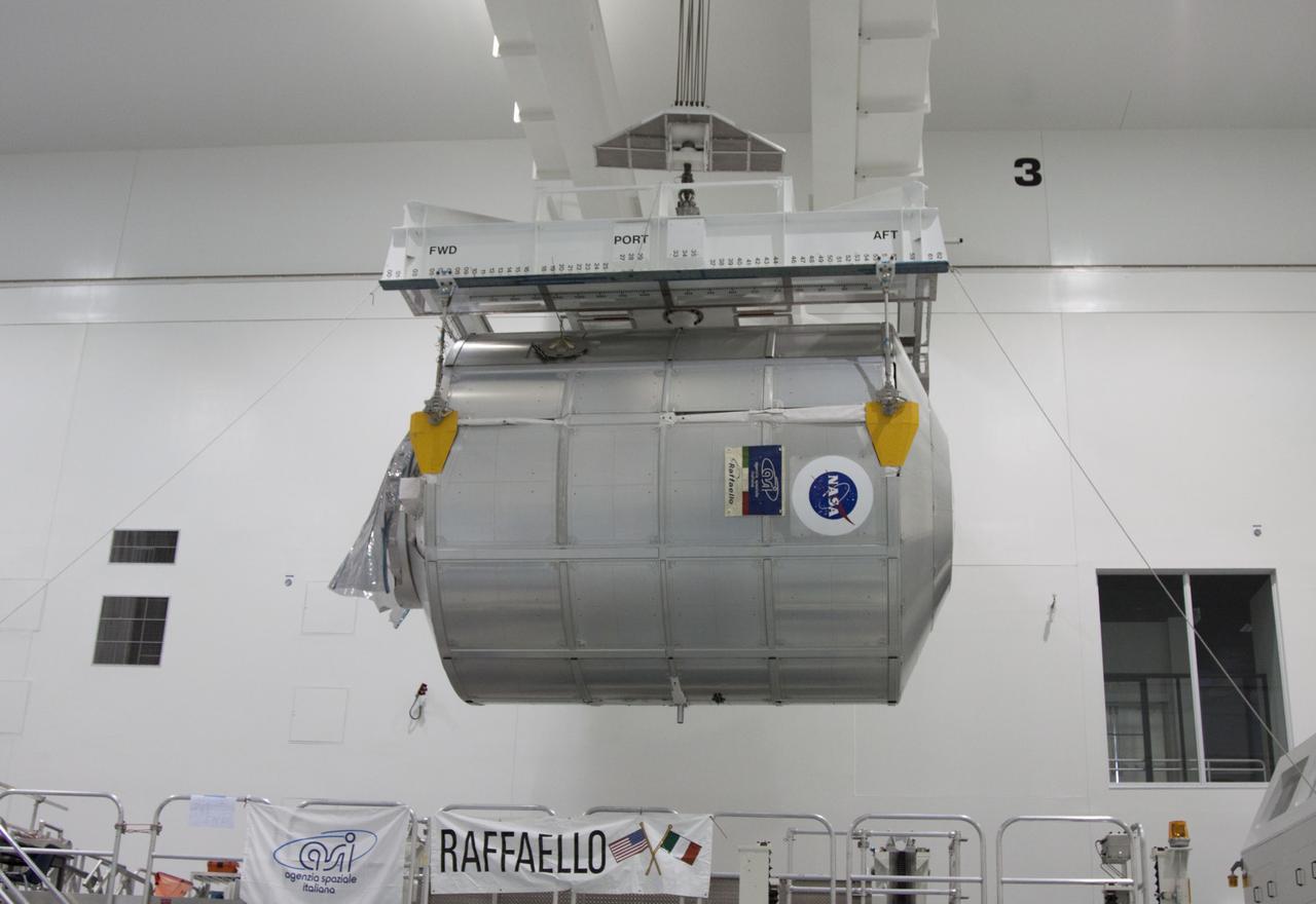 CAPE CANAVERAL, Fla. -- In the Space Station Processing Facility at NASA's Kennedy Space Center in Florida, an overhead crane moves the Raffaello multi-purpose logistics module, or MPLM, toward a payload canister. Commander Chris Ferguson, Pilot Doug Hurley and Mission Specialists Sandra Magnus and Rex Walheim are targeted to lift off on space shuttle Atlantis July 8, taking with them the MPLM packed with supplies, logistics and spare parts to the International Space Station. The STS-135 mission also will fly a system to investigate the potential for robotically refueling existing spacecraft and return a failed ammonia pump module to help NASA better understand the failure mechanism and improve pump designs for future systems. STS-135 will be the 33rd flight of Atlantis, the 37th shuttle mission to the space station, and the 135th and final mission of NASA's Space Shuttle Program. For more information, visit www.nasa.gov/mission_pages/shuttle/shuttlemissions/sts135/index.html. Photo credit: NASA/Jim Grossmann
