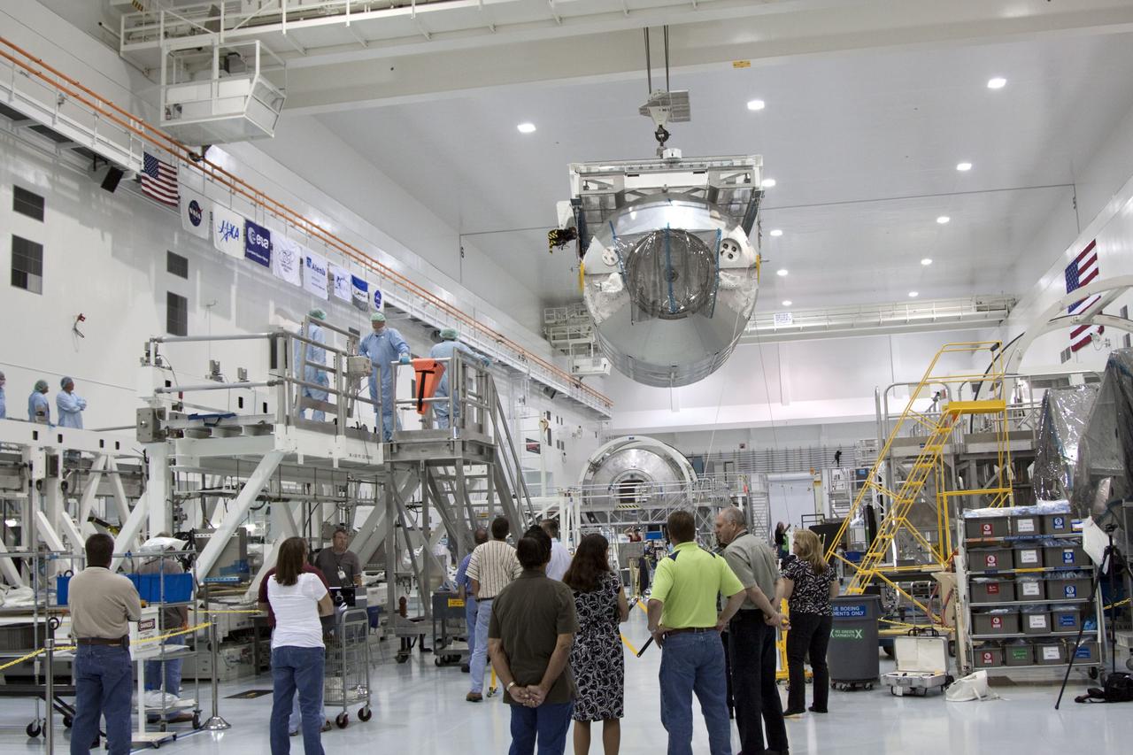CAPE CANAVERAL, Fla. -- In the Space Station Processing Facility at NASA's Kennedy Space Center in Florida, an overhead crane moves the Raffaello multi-purpose logistics module, or MPLM, toward a payload canister.    Commander Chris Ferguson, Pilot Doug Hurley and Mission Specialists Sandra Magnus and Rex Walheim are targeted to lift off on space shuttle Atlantis July 8, taking with them the MPLM packed with supplies, logistics and spare parts to the International Space Station. The STS-135 mission also will fly a system to investigate the potential for robotically refueling existing spacecraft and return a failed ammonia pump module to help NASA better understand the failure mechanism and improve pump designs for future systems. STS-135 will be the 33rd flight of Atlantis, the 37th shuttle mission to the space station, and the 135th and final mission of NASA's Space Shuttle Program. For more information, visit www.nasa.gov/mission_pages/shuttle/shuttlemissions/sts135/index.html. Photo credit: NASA/Jim Grossmann