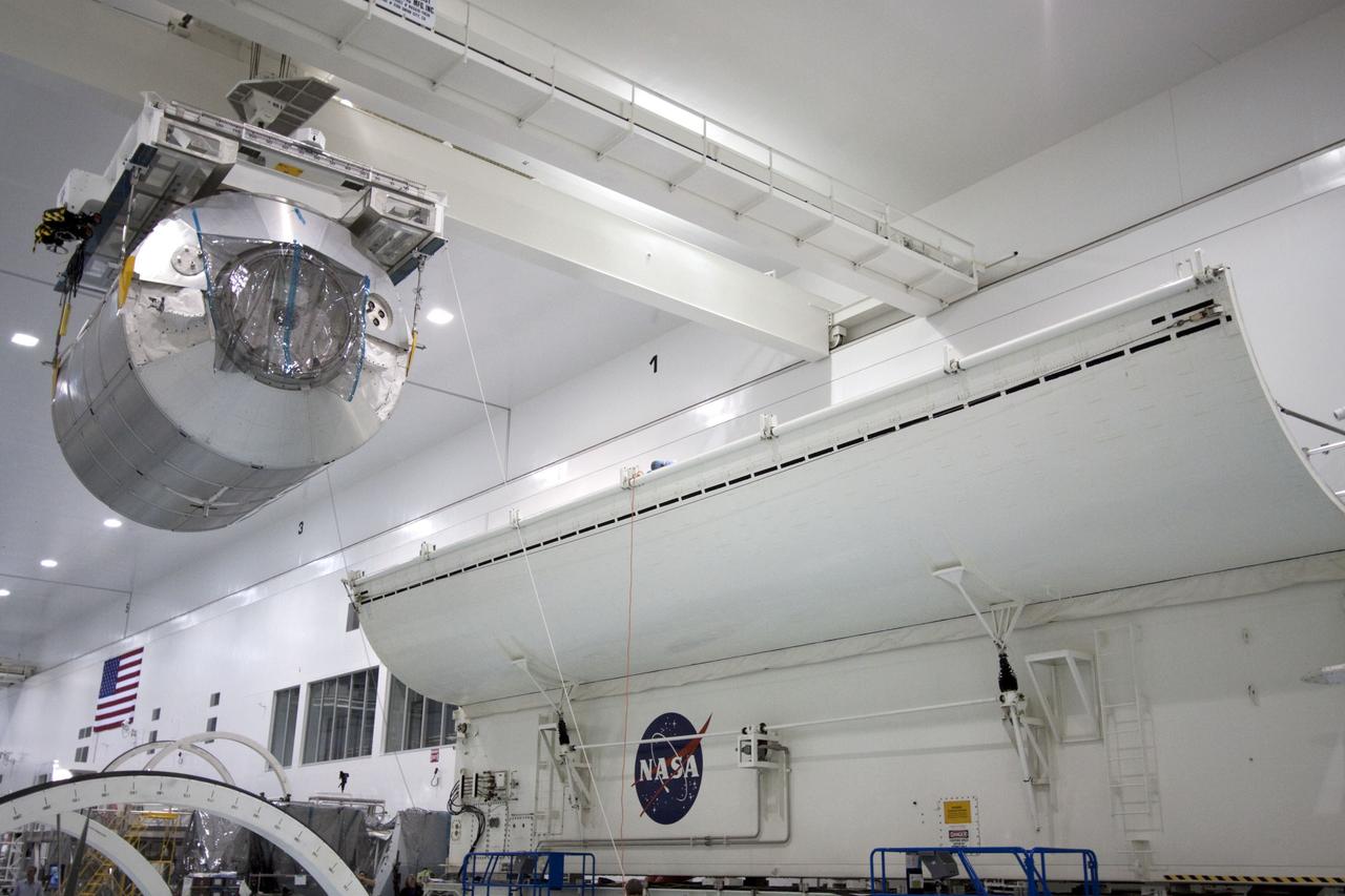 CAPE CANAVERAL, Fla. -- In the Space Station Processing Facility at NASA's Kennedy Space Center in Florida, an overhead crane moves the Raffaello multi-purpose logistics module, or MPLM, toward a payload canister.    Commander Chris Ferguson, Pilot Doug Hurley and Mission Specialists Sandra Magnus and Rex Walheim are targeted to lift off on space shuttle Atlantis July 8, taking with them the MPLM packed with supplies, logistics and spare parts to the International Space Station. The STS-135 mission also will fly a system to investigate the potential for robotically refueling existing spacecraft and return a failed ammonia pump module to help NASA better understand the failure mechanism and improve pump designs for future systems. STS-135 will be the 33rd flight of Atlantis, the 37th shuttle mission to the space station, and the 135th and final mission of NASA's Space Shuttle Program. For more information, visit www.nasa.gov/mission_pages/shuttle/shuttlemissions/sts135/index.html. Photo credit: NASA/Jim Grossmann