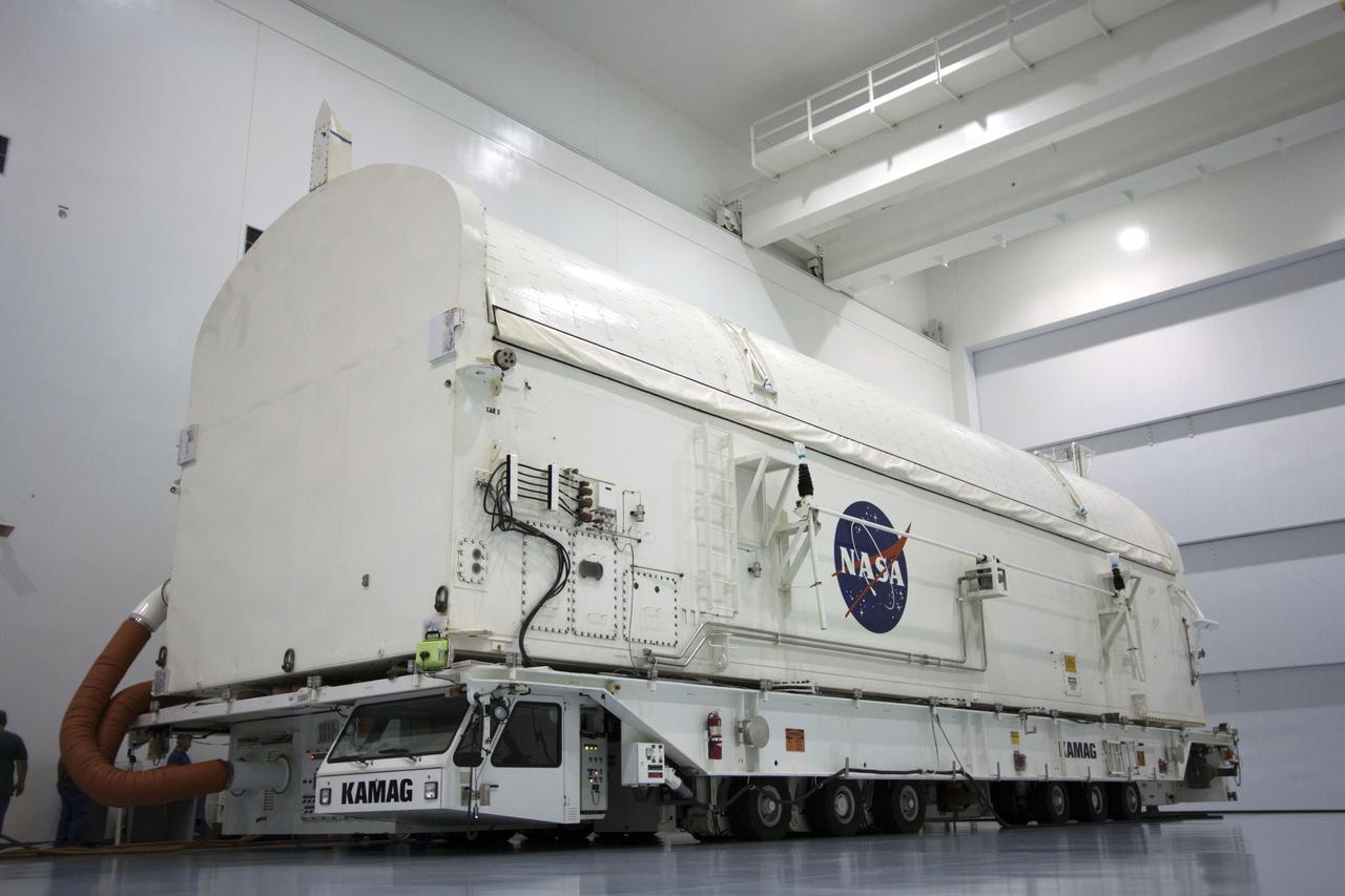 CAPE CANAVERAL, Fla. -- In the Space Station Processing Facility at NASA's Kennedy Space Center in Florida, the clamshell doors on the payload canister atop its transporter have been closed over the Raffaello multi-purpose logistics module, or MPLM, secured inside.    Commander Chris Ferguson, Pilot Doug Hurley and Mission Specialists Sandra Magnus and Rex Walheim are targeted to lift off on space shuttle Atlantis July 8, taking with them the MPLM packed with supplies, logistics and spare parts to the International Space Station. The STS-135 mission also will fly a system to investigate the potential for robotically refueling existing spacecraft and return a failed ammonia pump module to help NASA better understand the failure mechanism and improve pump designs for future systems. STS-135 will be the 33rd flight of Atlantis, the 37th shuttle mission to the space station, and the 135th and final mission of NASA's Space Shuttle Program. For more information, visit www.nasa.gov/mission_pages/shuttle/shuttlemissions/sts135/index.html. Photo credit: NASA/Jim Grossmann