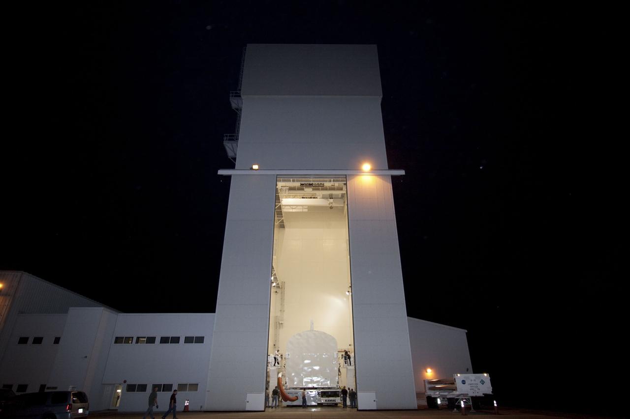 CAPE CANAVERAL, Fla. -- Workers have delivered the payload canister, atop its transporter with the Raffaello multi-purpose logistics module, or MPLM, secured inside, to the Canister Rotation Facility at NASA's Kennedy Space Center in Florida.       Commander Chris Ferguson, Pilot Doug Hurley and Mission Specialists Sandra Magnus and Rex Walheim are targeted to lift off on space shuttle Atlantis July 8, taking with them the MPLM packed with supplies, logistics and spare parts to the International Space Station. The STS-135 mission also will fly a system to investigate the potential for robotically refueling existing spacecraft and return a failed ammonia pump module to help NASA better understand the failure mechanism and improve pump designs for future systems. STS-135 will be the 33rd flight of Atlantis, the 37th shuttle mission to the space station, and the 135th and final mission of NASA's Space Shuttle Program. For more information, visit www.nasa.gov/mission_pages/shuttle/shuttlemissions/sts135/index.html. Photo credit: NASA/Jim Grossmann