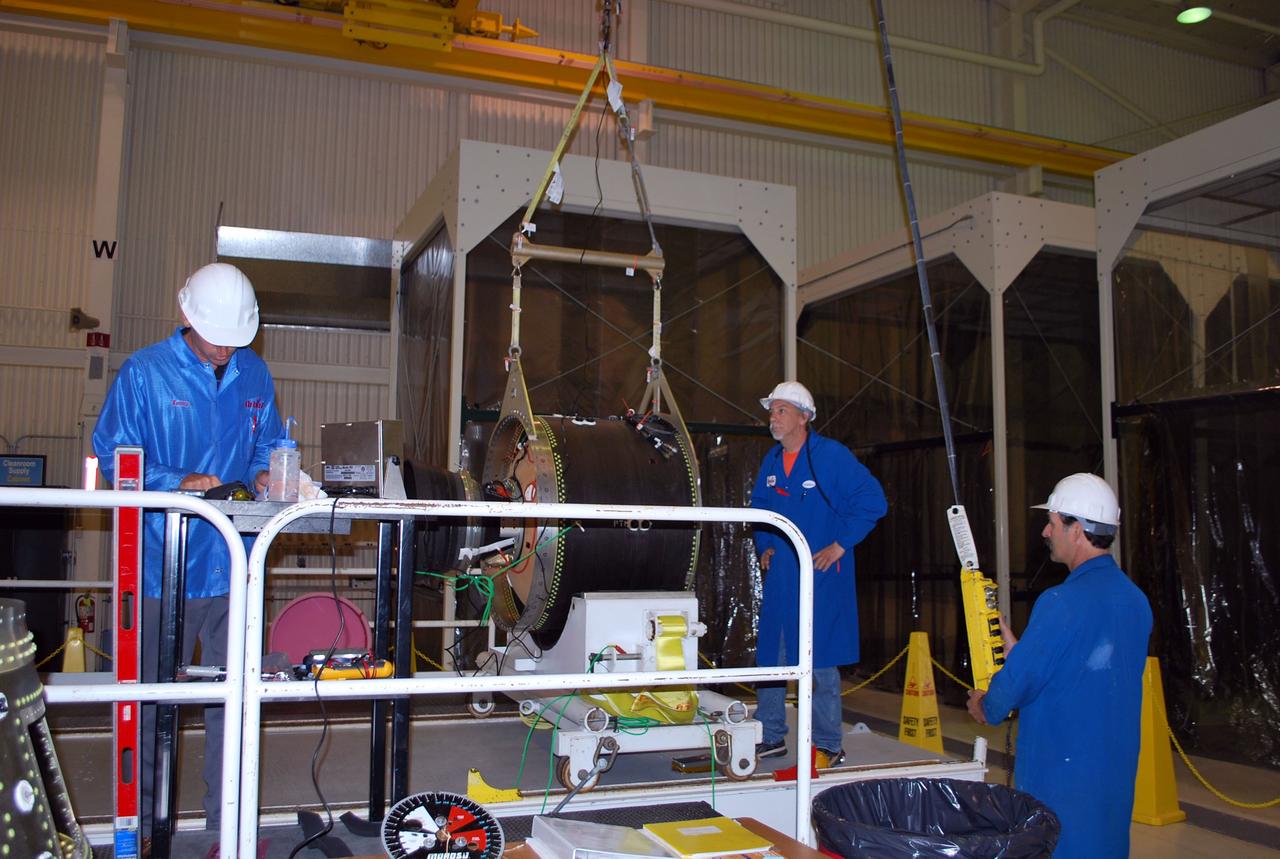 VANDENBERG AIR FORCE BASE, Calif. -- At Vandenberg Air Force Base in California, Orbital Sciences Corp. technicians weigh stage 3 of the Pegasus XL rocket motor that will launch the Nuclear Spectroscopic Telescope Array (NuSTAR) into space.    After the rocket and spacecraft are processed at Vandenberg, they will be flown on the Orbital Sciences' L-1011 carrier aircraft to the Ronald Reagan Ballistic Missile Defense Test Site located at the Pacific Ocean’s Kwajalein Atoll for launch. The high-energy X-ray telescope will conduct a census for black holes, map radioactive material in young supernovae remnants, and study the origins of cosmic rays and the extreme physics around collapsed stars. Photo credit: NASA/Randy Beaudoin, VAFB