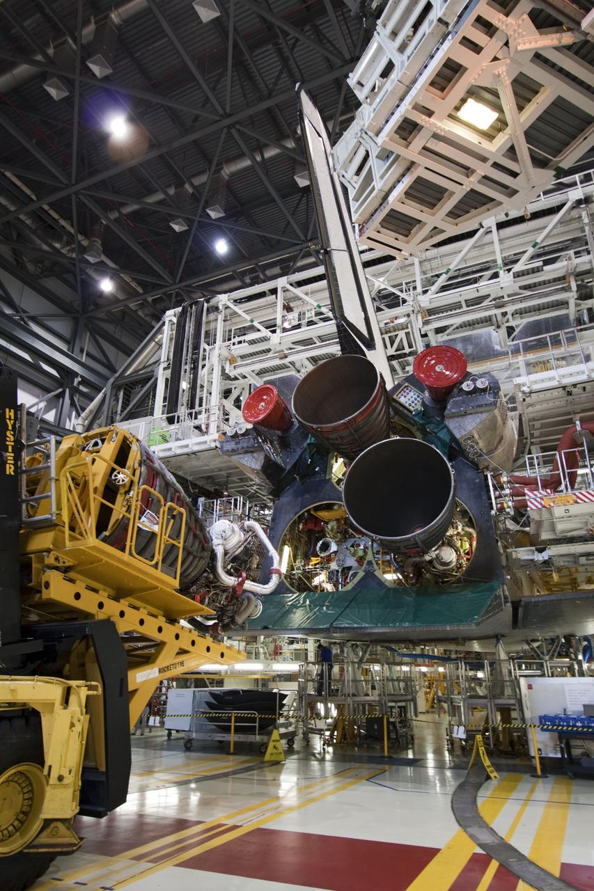 CAPE CANAVERAL, Fla. -- In Orbiter Processing Facility-1 at NASA's Kennedy Space Center in Florida, technicians carefully remove engine No. 2, one of three space shuttle main engines from Endeavour, using a specially designed engine installer, called a Hyster forklift. The removal is part of Endeavour's transition and retirement processing. Endeavour is being prepared for public display at the California Science Center in Los Angeles. Endeavour flew 25 missions, spent 299 days in space, orbited Earth 4,671 times and traveled 122,883,151 miles over the course of its 19-year career. Photo credit: NASA/Jim Grossmann