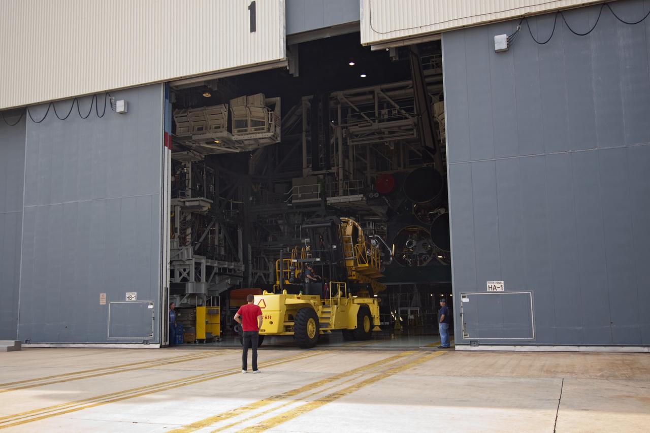 CAPE CANAVERAL, Fla. -- In Orbiter Processing Facility-1 at NASA's Kennedy Space Center in Florida, technicians have removed engine No. 2, one of three space shuttle main engines from Endeavour, using a specially designed engine installer, called a Hyster forklift. The removal is part of Endeavour's transition and retirement processing. Endeavour is being prepared for public display at the California Science Center in Los Angeles. Endeavour flew 25 missions, spent 299 days in space, orbited Earth 4,671 times and traveled 122,883,151 miles over the course of its 19-year career. Photo credit: NASA/Jim Grossmann