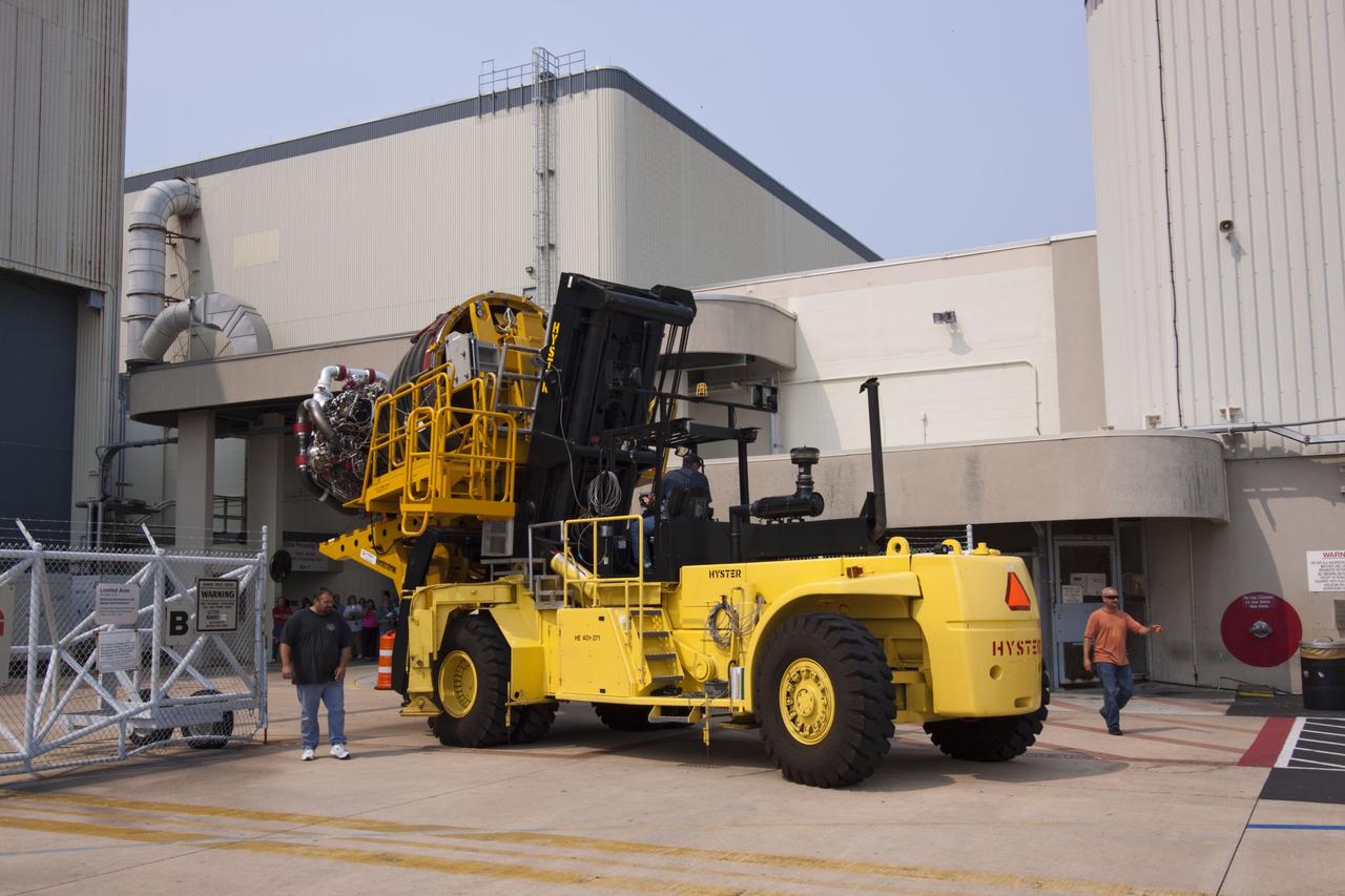 CAPE CANAVERAL, Fla. -- Engine No. 2, one of three space shuttle main engines, was removed from Endeavour and is being transported from Orbiter Processing Facility-1 to the Space Shuttle Main Engine Processing Facility at NASA's Kennedy Space Center in Florida. The removal is part of Endeavour's transition and retirement processing. Endeavour is being prepared for public display at the California Science Center in Los Angeles. Endeavour flew 25 missions, spent 299 days in space, orbited Earth 4,671 times and traveled 122,883,151 miles over the course of its 19-year career. Photo credit: NASA/Jim Grossmann