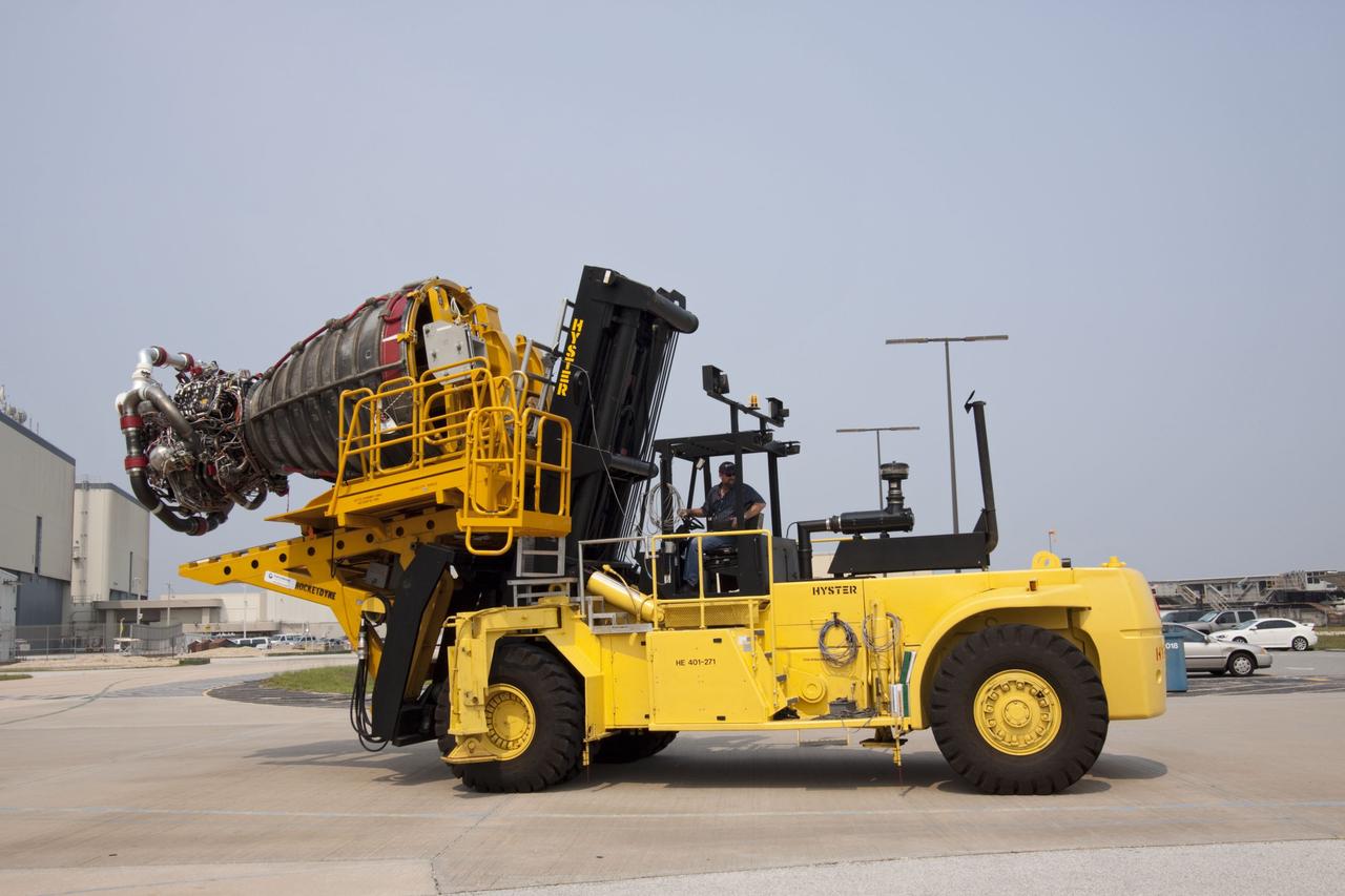 CAPE CANAVERAL, Fla. -- Engine No. 2, one of three space shuttle main engines, was removed from Endeavour and is being transported from Orbiter Processing Facility-1 to the Space Shuttle Main Engine Processing Facility at NASA's Kennedy Space Center in Florida. The removal is part of Endeavour's transition and retirement processing. Endeavour is being prepared for public display at the California Science Center in Los Angeles. Endeavour flew 25 missions, spent 299 days in space, orbited Earth 4,671 times and traveled 122,883,151 miles over the course of its 19-year career. Photo credit: NASA/Jim Grossmann