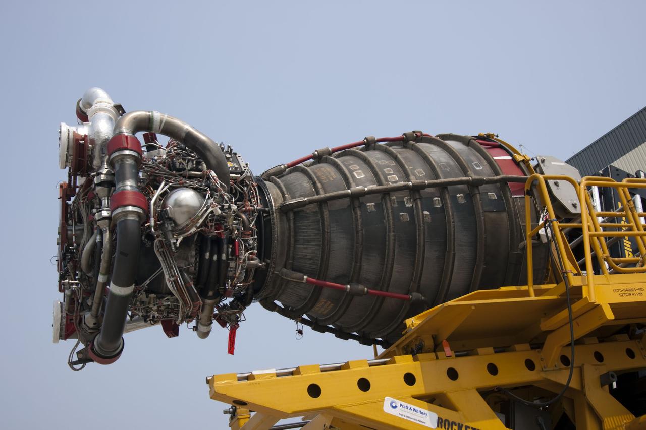 CAPE CANAVERAL, Fla. -- Engine No. 2, one of three space shuttle main engines, was removed from Endeavour and is being transported from Orbiter Processing Facility-1 to the Space Shuttle Main Engine Processing Facility at NASA's Kennedy Space Center in Florida. The removal is part of Endeavour's transition and retirement processing. Endeavour is being prepared for public display at the California Science Center in Los Angeles. Endeavour flew 25 missions, spent 299 days in space, orbited Earth 4,671 times and traveled 122,883,151 miles over the course of its 19-year career. Photo credit: NASA/Jim Grossmann