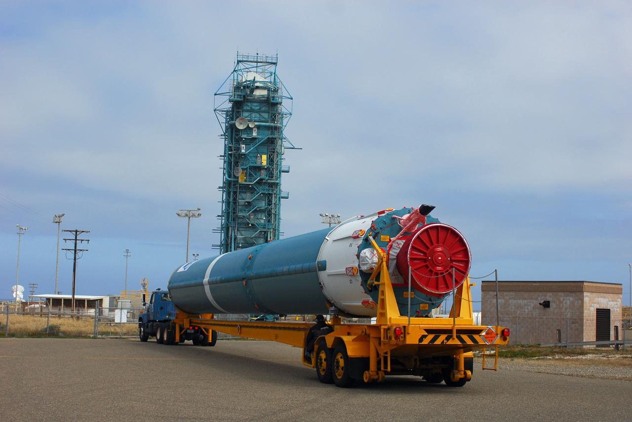 VANDENBERG AIR FORCE BASE, Calif. -- At Vandenberg Air Force Base in California, the first stage of a United Launch Alliance Delta II that will carry the National Polar-orbiting Operational Environmental Satellite System Preparatory Project (NPP) satellite into space has arrived at NASA's Launch Complex-2. The vehicle will undergo initial testing at the United Launch Alliance Delta Mission Checkout Facility.        NPP will be positioned 512 miles above the Earth's surface and will orbit about 16 times each day to observe nearly the entire globe. The NPP mission for NASA and the National Oceanic and Atmospheric Administration (NOAA) is to measure Earth's atmospheric and sea surface temperatures, humidity sounding, land and ocean biological activity, and cloud and aerosol properties. For more information, visit www.nasa.gov/NPP. Photo credit: NASA/VAFB