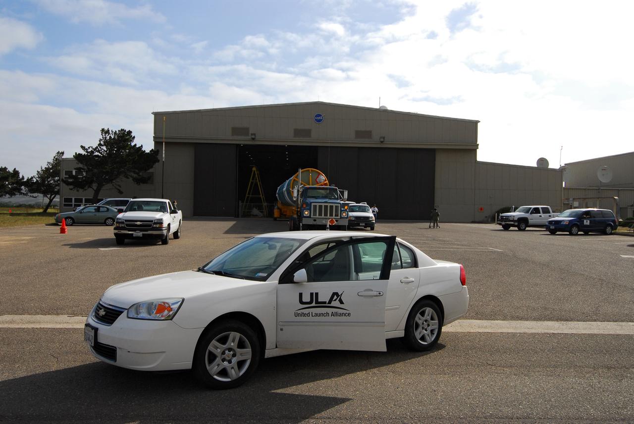 VANDENBERG AIR FORCE BASE, Calif. -- At Vandenberg Air Force Base in California, the first stage of a United Launch Alliance Delta II that will carry the National Polar-orbiting Operational Environmental Satellite System Preparatory Project (NPP) satellite into space has arrived at NASA's Launch Complex-2. The vehicle will undergo initial testing at the United Launch Alliance Delta Mission Checkout Facility.         NPP will be positioned 512 miles above the Earth's surface and will orbit about 16 times each day to observe nearly the entire globe. The NPP mission for NASA and the National Oceanic and Atmospheric Administration (NOAA) is to measure Earth's atmospheric and sea surface temperatures, humidity sounding, land and ocean biological activity, and cloud and aerosol properties. For more information, visit www.nasa.gov/NPP. Photo credit: NASA/VAFB