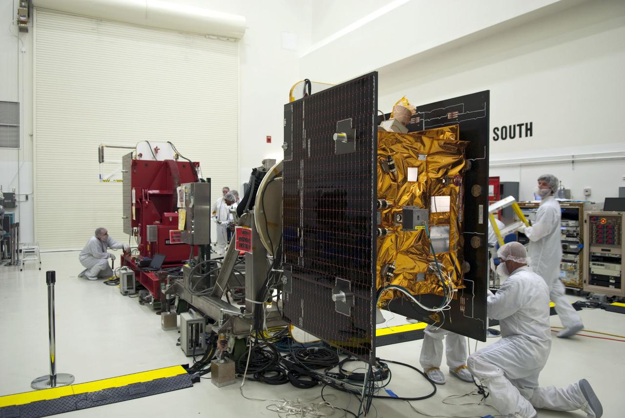 CAPE CANAVERAL, Fla. -- Technicians at Astrotech payload processing facility in Titusville, Fla., are preparing NASA's Gravity Recovery and Interior Laboratory, or GRAIL, twin spacecraft for solar panel deployment testing. The United Launch Alliance Delta II rocket that will carry GRAIL into lunar orbit already is fully stacked at NASA's Space Launch Complex 17B, and launch is scheduled for Sept. 8. The GRAIL mission is a part of NASA's Discovery Program. GRAIL will fly the twin spacecraft in tandem orbits around the moon for several months to measure its gravity field. The mission also will answer longstanding questions about Earth's moon and provide scientists a better understanding of how Earth and other rocky planets in the solar system formed. For more information, visit http://solarsystem.nasa.gov/grail/. Photo credit: NASA/Jim Grossmann