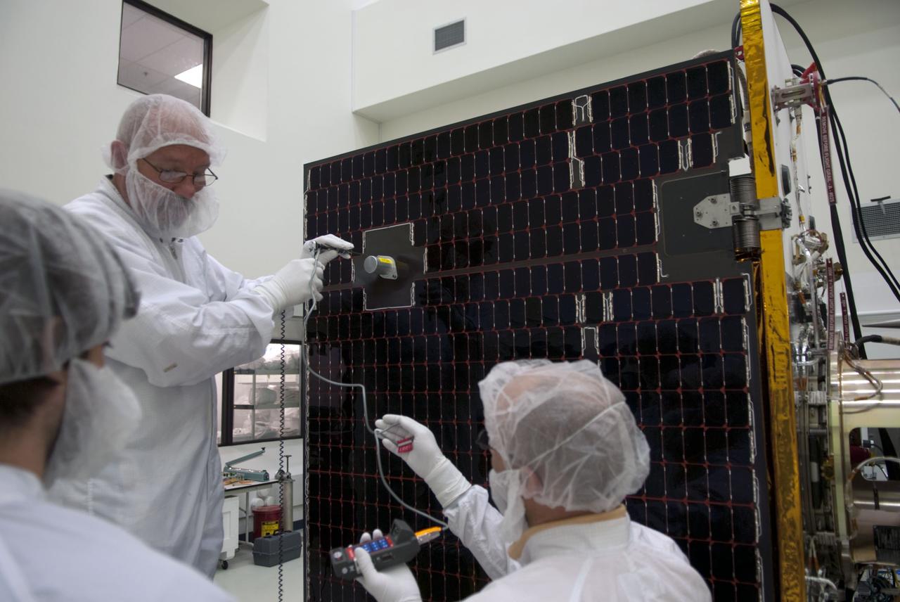 CAPE CANAVERAL, Fla. -- Technicians at Astrotech payload processing facility in Titusville, Fla., are preparing NASA's Gravity Recovery and Interior Laboratory, or GRAIL, twin spacecraft for solar panel deployment testing.    The United Launch Alliance Delta II rocket that will carry GRAIL into lunar orbit already is fully stacked at NASA's Space Launch Complex 17B, and launch is scheduled for Sept. 8. The GRAIL mission is a part of NASA's Discovery Program. GRAIL will fly the twin spacecraft in tandem orbits around the moon for several months to measure its gravity field. The mission also will answer longstanding questions about Earth's moon and provide scientists a better understanding of how Earth and other rocky planets in the solar system formed. For more information, visit http://solarsystem.nasa.gov/grail/.  Photo credit: NASA/Jim Grossmann