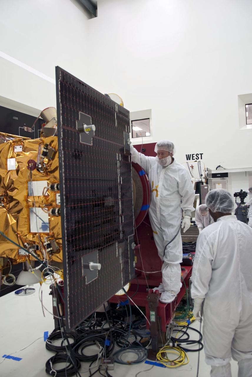CAPE CANAVERAL, Fla. -- Technicians at Astrotech payload processing facility in Titusville, Fla., are conducting solar panel deployment tests on NASA's Gravity Recovery and Interior Laboratory, or GRAIL, twin spacecraft. The United Launch Alliance Delta II rocket that will carry GRAIL into lunar orbit already is fully stacked at NASA's Space Launch Complex 17B, and launch is scheduled for Sept. 8. The GRAIL mission is a part of NASA's Discovery Program. GRAIL will fly the twin spacecraft in tandem orbits around the moon for several months to measure its gravity field. The mission also will answer longstanding questions about Earth's moon and provide scientists a better understanding of how Earth and other rocky planets in the solar system formed. For more information, visit http://solarsystem.nasa.gov/grail/. Photo credit: NASA/Jim Grossmann