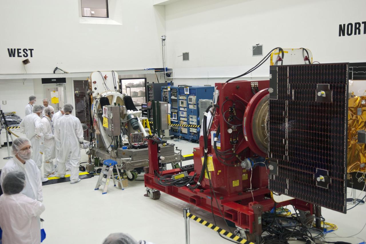 CAPE CANAVERAL, Fla. -- Technicians at Astrotech payload processing facility in Titusville, Fla., are conducting solar panel deployment tests on NASA's Gravity Recovery and Interior Laboratory, or GRAIL, twin spacecraft. The United Launch Alliance Delta II rocket that will carry GRAIL into lunar orbit already is fully stacked at NASA's Space Launch Complex 17B, and launch is scheduled for Sept. 8. The GRAIL mission is a part of NASA's Discovery Program. GRAIL will fly the twin spacecraft in tandem orbits around the moon for several months to measure its gravity field. The mission also will answer longstanding questions about Earth's moon and provide scientists a better understanding of how Earth and other rocky planets in the solar system formed. For more information, visit http://solarsystem.nasa.gov/grail/. Photo credit: NASA/Jim Grossmann