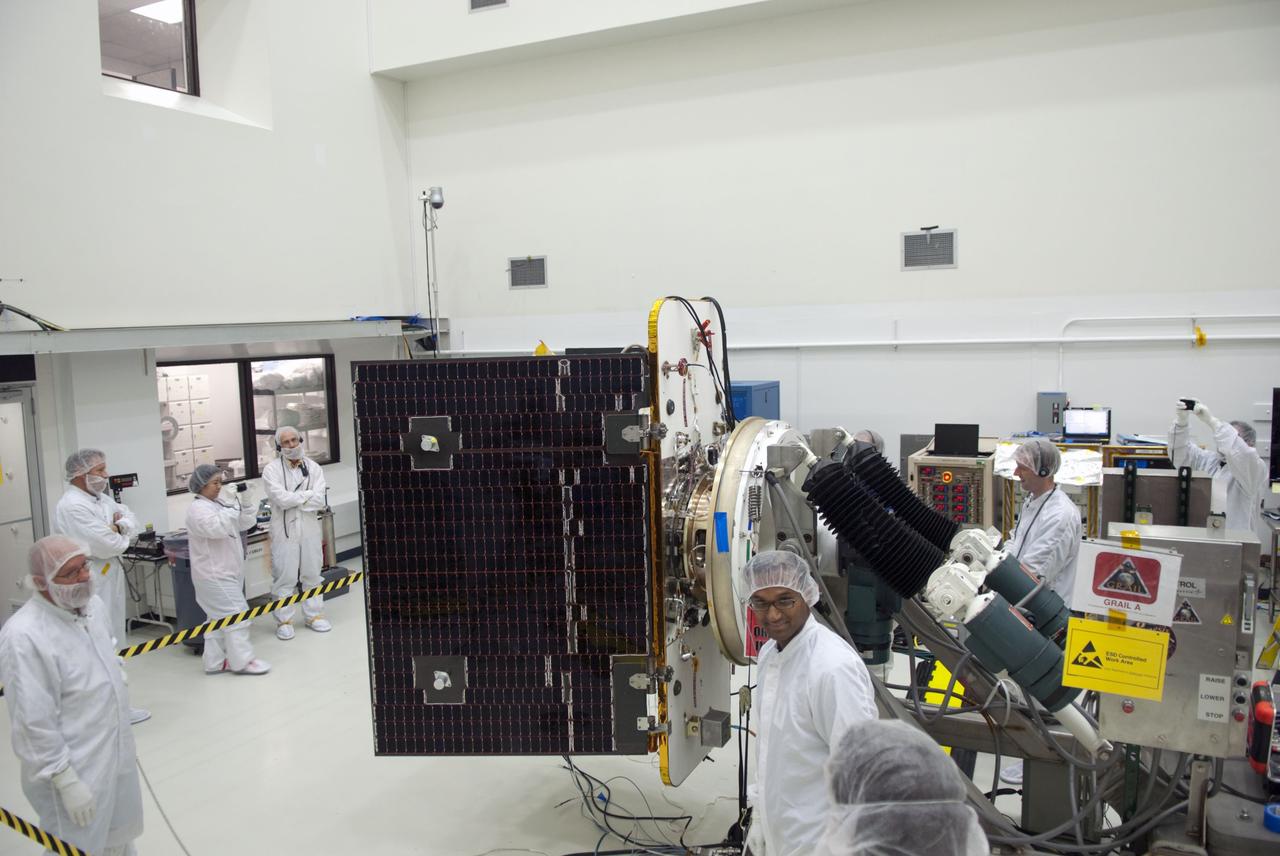 CAPE CANAVERAL, Fla. -- Technicians at Astrotech payload processing facility in Titusville, Fla., are conducting solar panel deployment tests on NASA's Gravity Recovery and Interior Laboratory, or GRAIL, twin spacecraft. The United Launch Alliance Delta II rocket that will carry GRAIL into lunar orbit already is fully stacked at NASA's Space Launch Complex 17B, and launch is scheduled for Sept. 8. The GRAIL mission is a part of NASA's Discovery Program. GRAIL will fly the twin spacecraft in tandem orbits around the moon for several months to measure its gravity field. The mission also will answer longstanding questions about Earth's moon and provide scientists a better understanding of how Earth and other rocky planets in the solar system formed. For more information, visit http://solarsystem.nasa.gov/grail/. Photo credit: NASA/Jim Grossmann