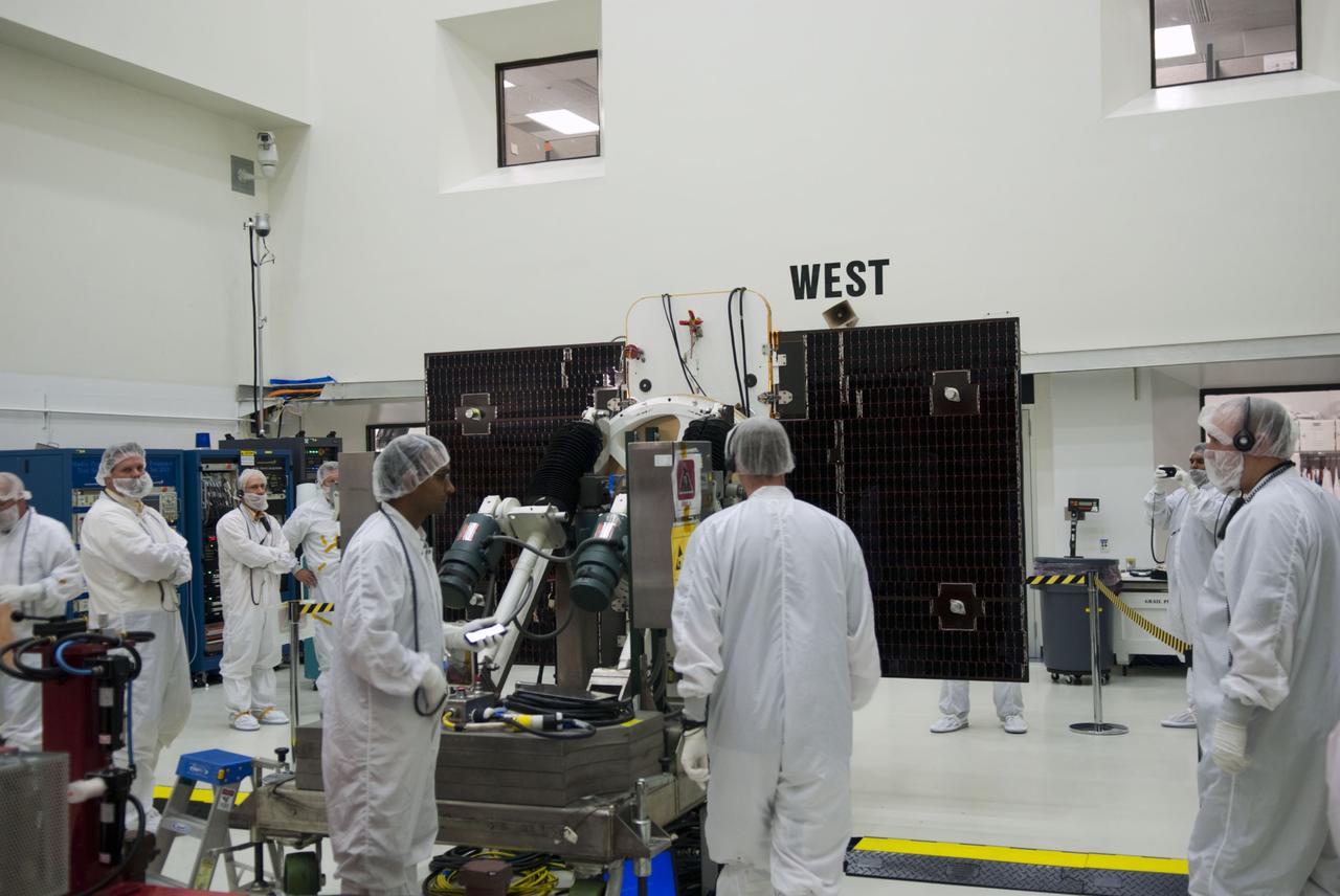 CAPE CANAVERAL, Fla. -- Technicians at Astrotech payload processing facility in Titusville, Fla., are conducting solar panel deployment tests on NASA's Gravity Recovery and Interior Laboratory, or GRAIL, twin spacecraft. The United Launch Alliance Delta II rocket that will carry GRAIL into lunar orbit already is fully stacked at NASA's Space Launch Complex 17B, and launch is scheduled for Sept. 8. The GRAIL mission is a part of NASA's Discovery Program. GRAIL will fly the twin spacecraft in tandem orbits around the moon for several months to measure its gravity field. The mission also will answer longstanding questions about Earth's moon and provide scientists a better understanding of how Earth and other rocky planets in the solar system formed. For more information, visit http://solarsystem.nasa.gov/grail/. Photo credit: NASA/Jim Grossmann