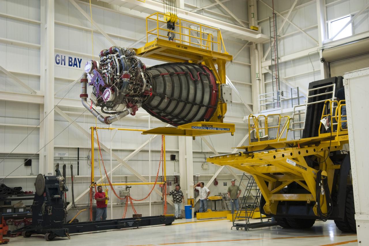 CAPE CANAVERAL, Fla. -- In the engine shop at NASA's Kennedy Space Center in Florida, workers are moving engine No. 3, one of three space shuttle main engines from Endeavour, to a work stand for processing. The work is part of Endeavour's transition and retirement processing. Endeavour is being prepared for public display at the California Science Center in Los Angeles. Endeavour flew 25 missions, spent 299 days in space, orbited Earth 4,671 times and traveled 122,883,151 miles over the course of its 19-year career. Endeavour's STS-134 and final mission was completed after landing on June 1, 2011. Photo credit: NASA/Jim Grossmann