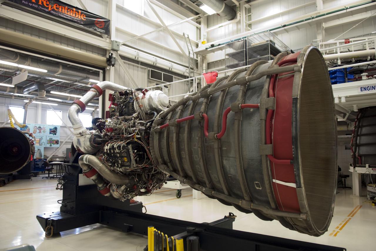 CAPE CANAVERAL, Fla. -- In the engine shop at NASA's Kennedy Space Center in Florida, workers have moved engine No. 3, one of three space shuttle main engines from Endeavour, to a work stand for processing. Engine No. 2 can be seen on a work stand in the left background already being processed. The work is part of Endeavour's transition and retirement processing. Endeavour is being prepared for public display at the California Science Center in Los Angeles. Endeavour flew 25 missions, spent 299 days in space, orbited Earth 4,671 times and traveled 122,883,151 miles over the course of its 19-year career. Endeavour's STS-134 and final mission was completed after landing on June 1, 2011. Photo credit: NASA/Jim Grossmann
